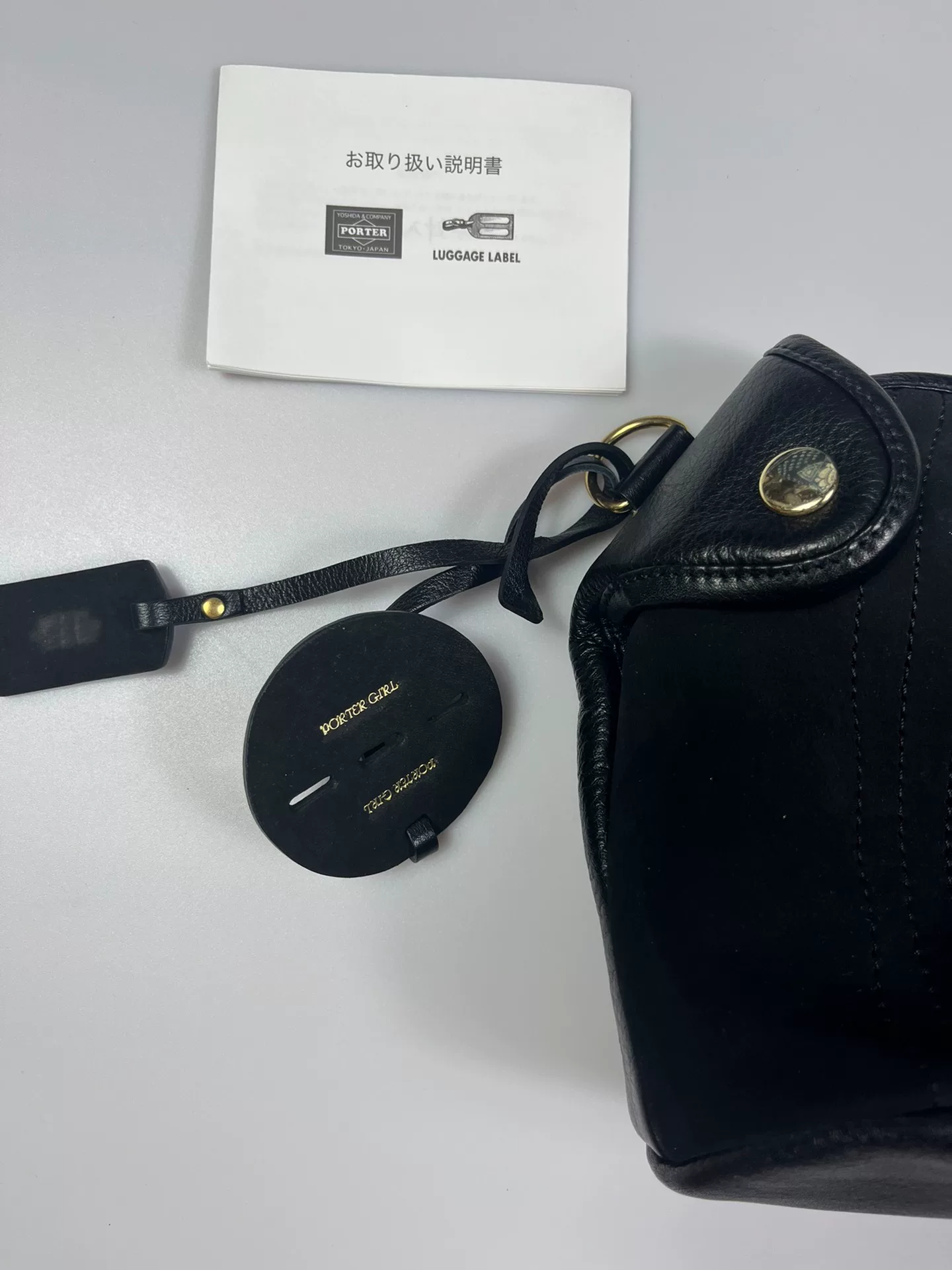 Porter Small Black Leather Crossbody Bag — detail