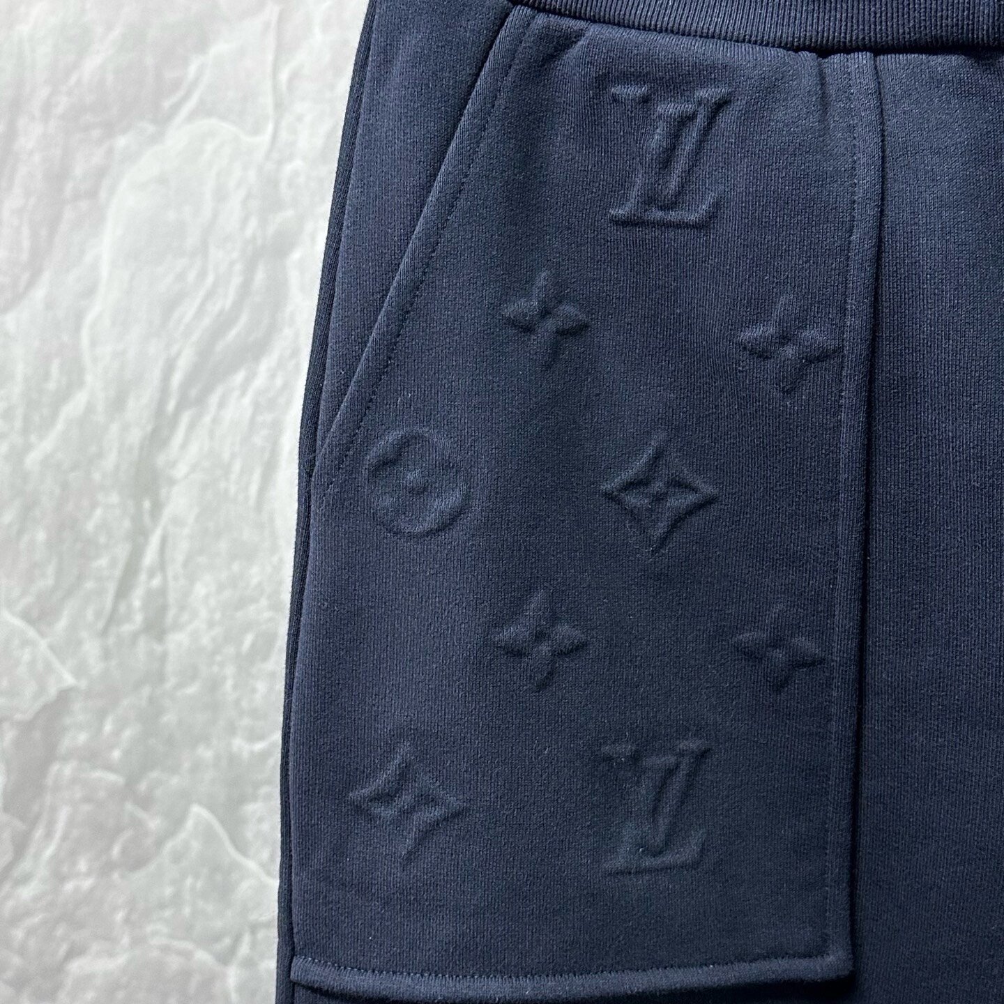 Louis Vuitton SS26 Embossed Drawstring Pants — detail