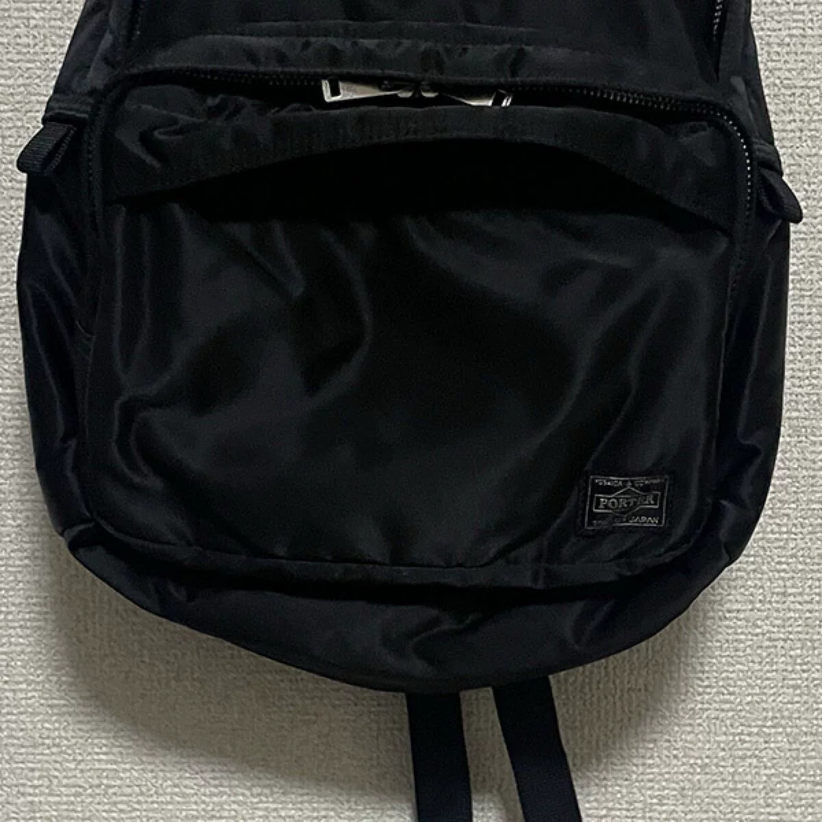 Porter Tanker New Black Backpack — label