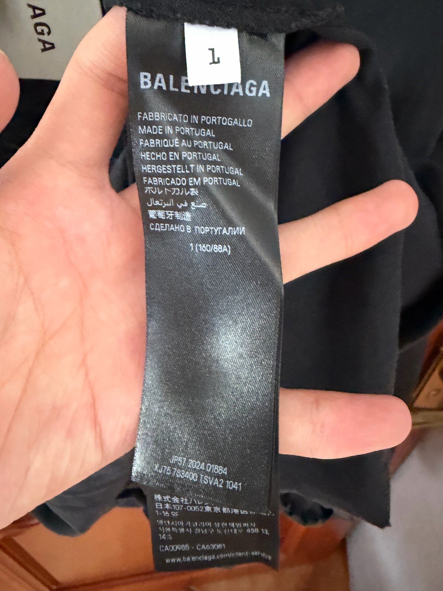 Balenciaga Distressed Embossed Logo Long Sleeve T-Shirt — back