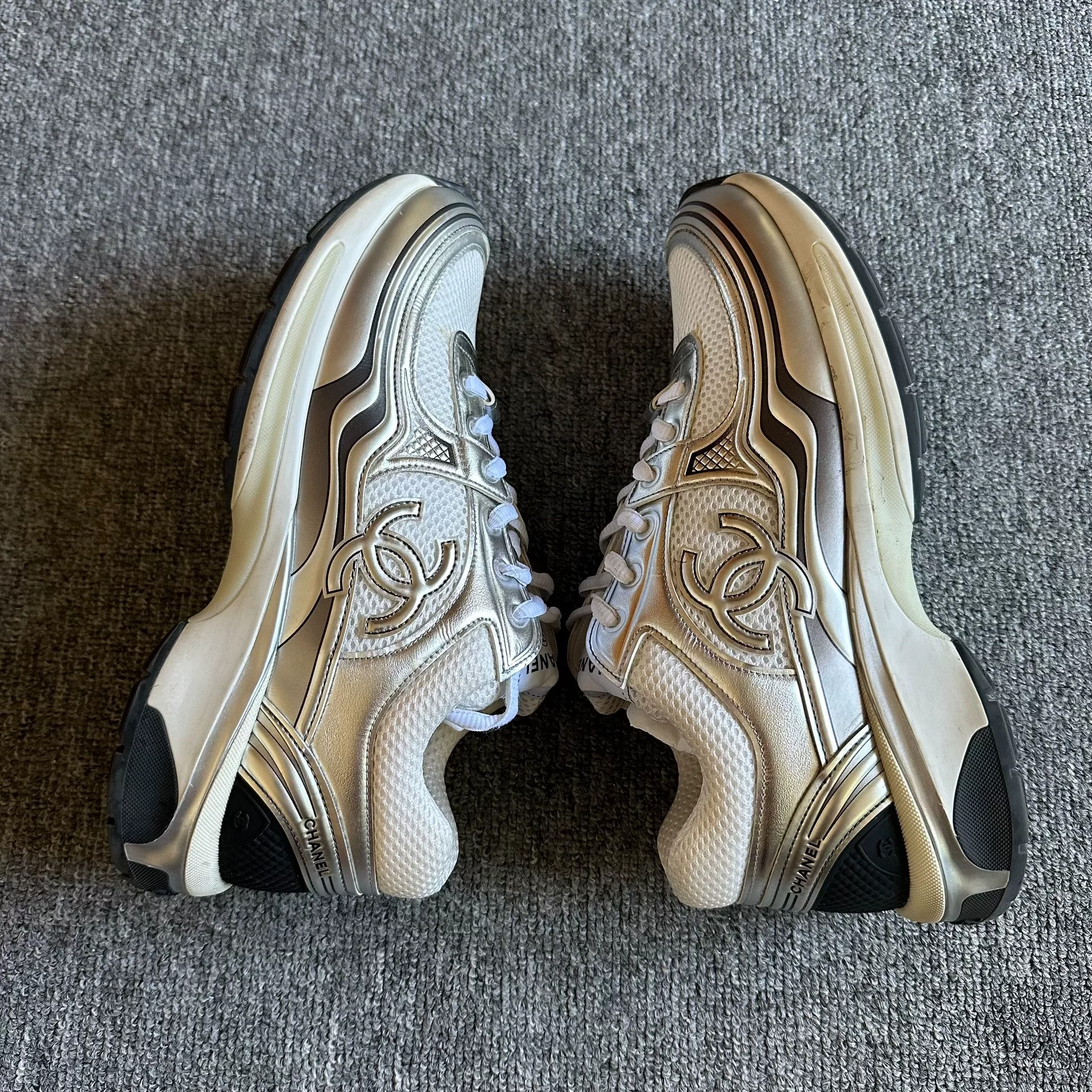 Chanel Silver Gold Accent Sneakers — label