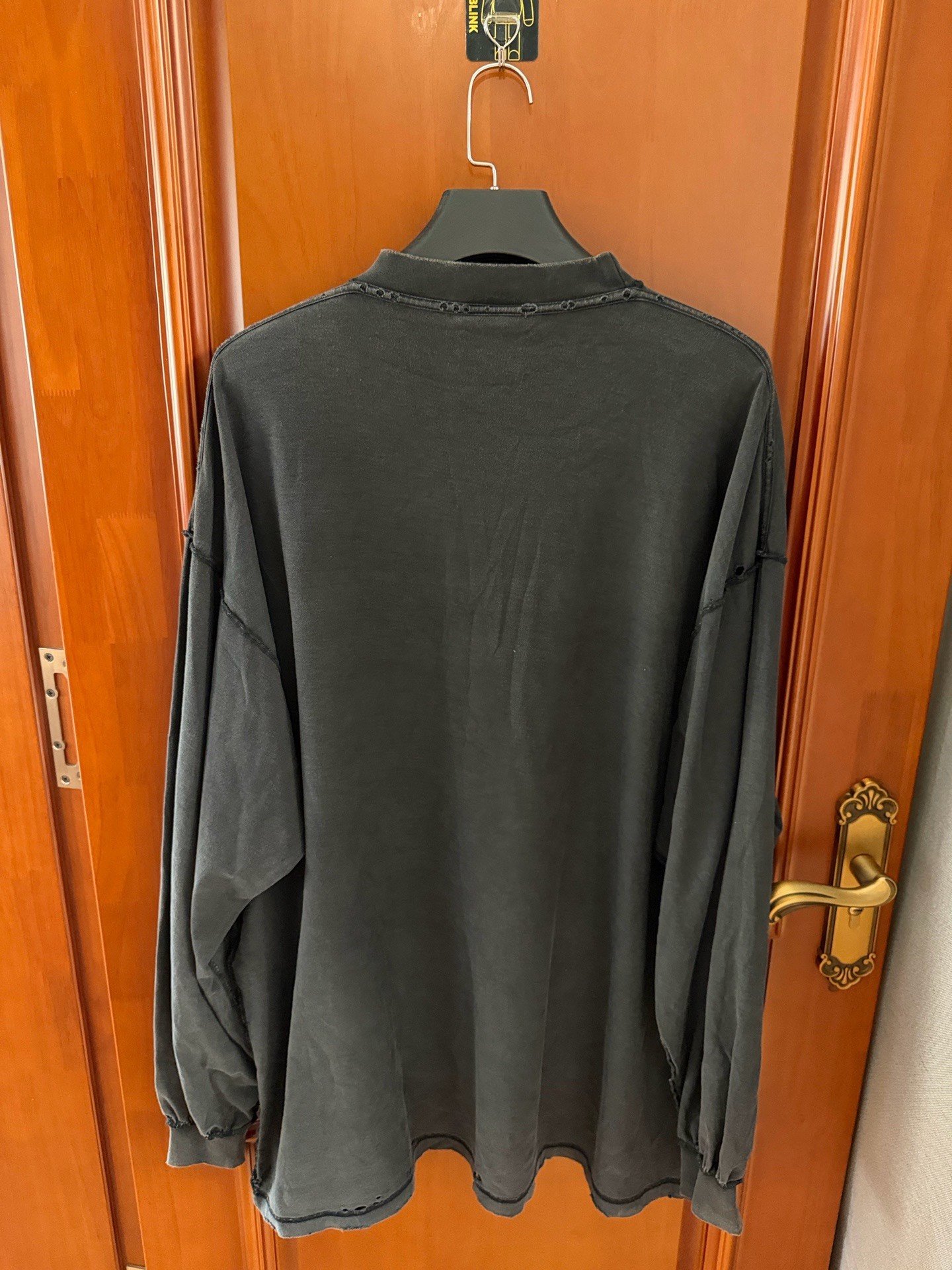Balenciaga Distressed Embossed Logo Long-Sleeve T-Shirt — front