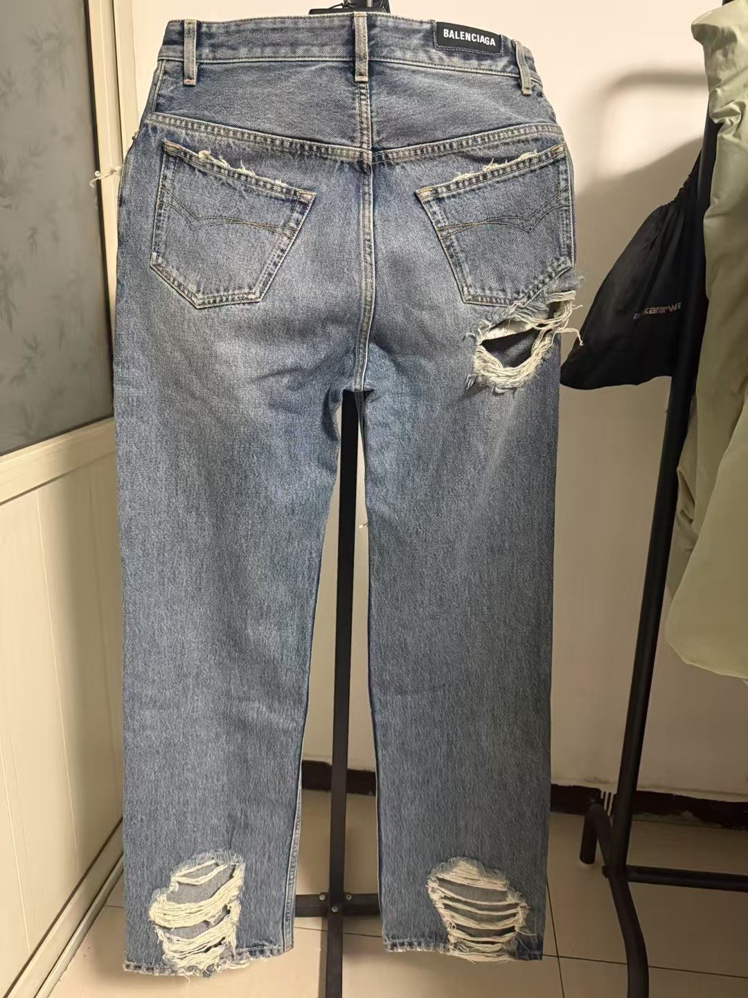 Balenciaga Washed Distressed Jeans — front