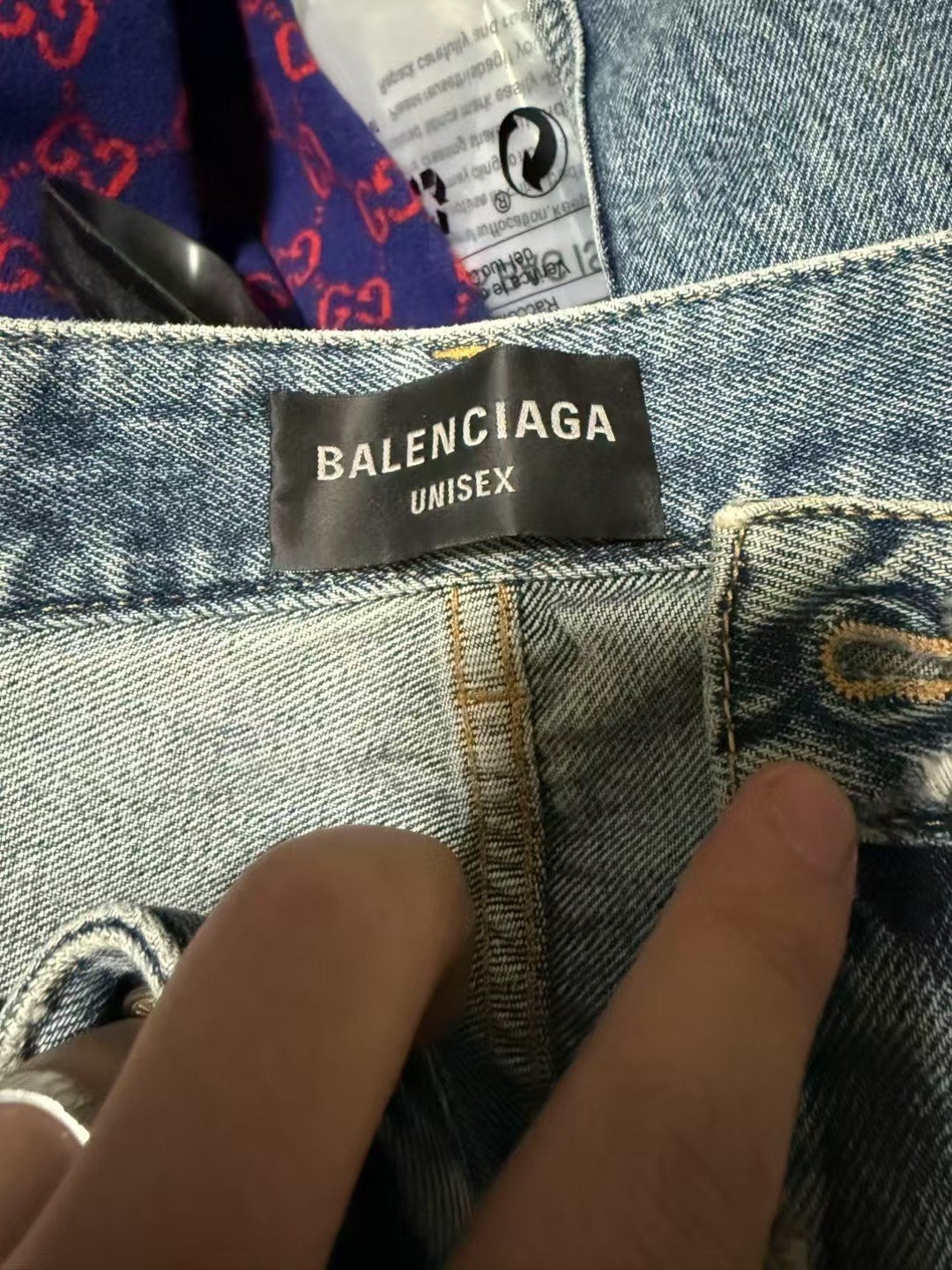 Balenciaga Washed Distressed Jeans — detail