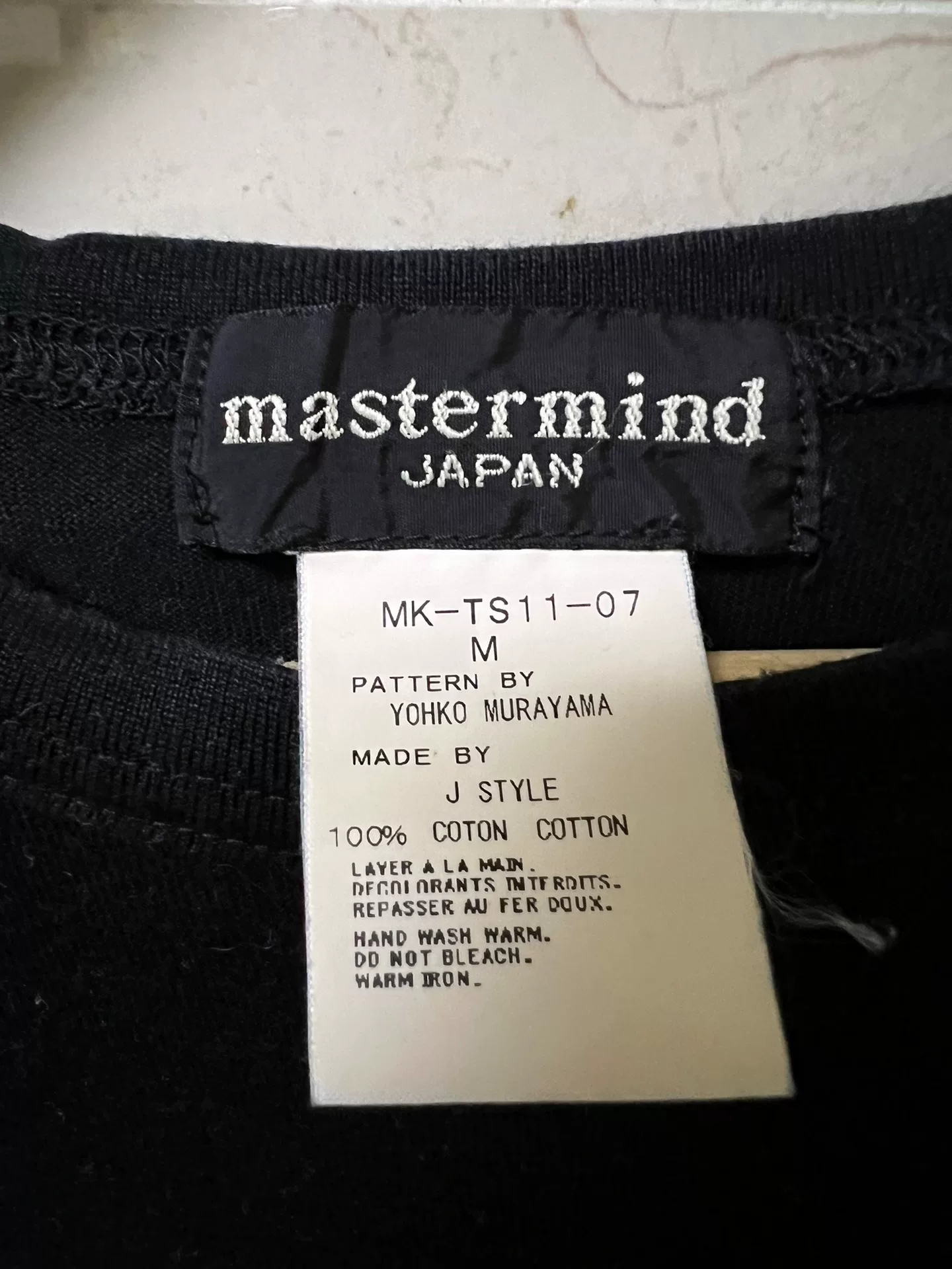 Mastermind Japan Stitch Skull Tee — label
