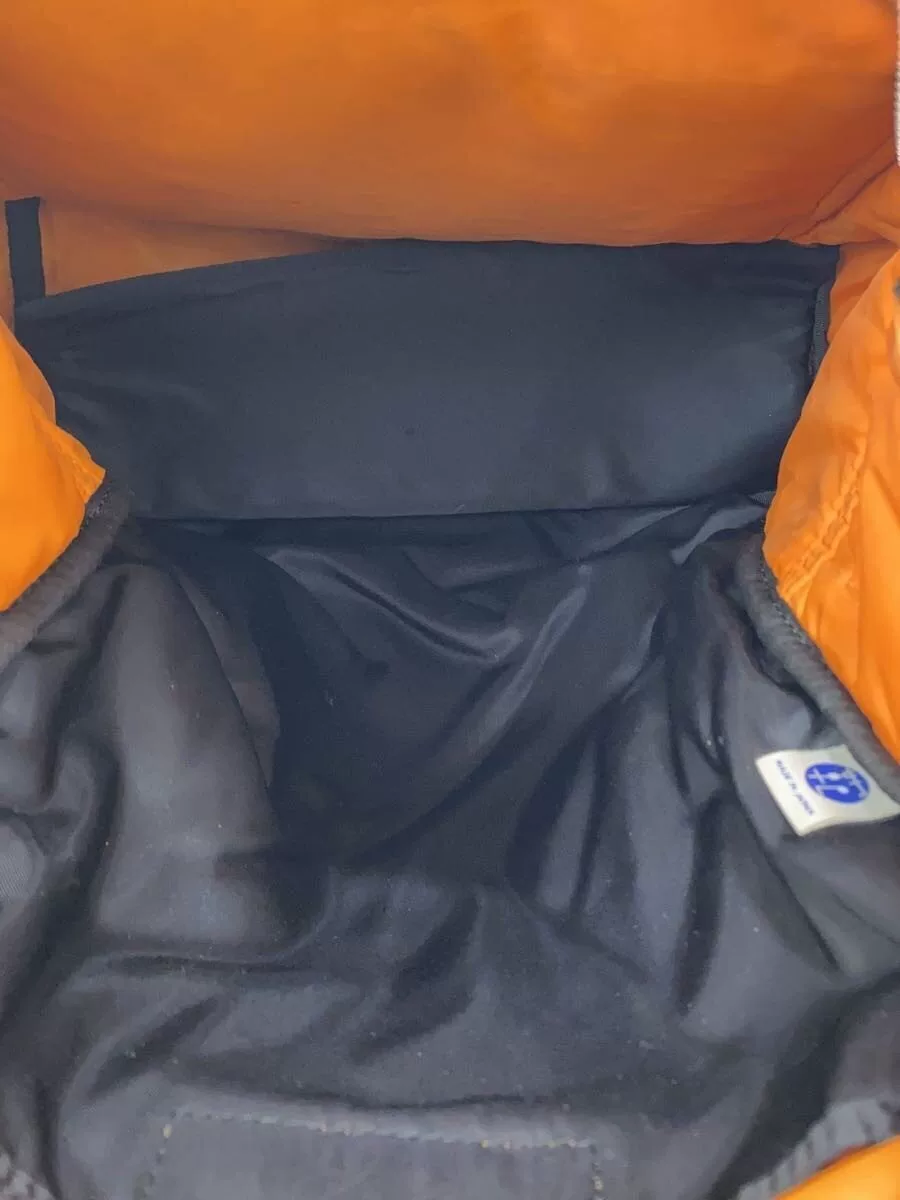 PORTER Black Nylon Backpack — label