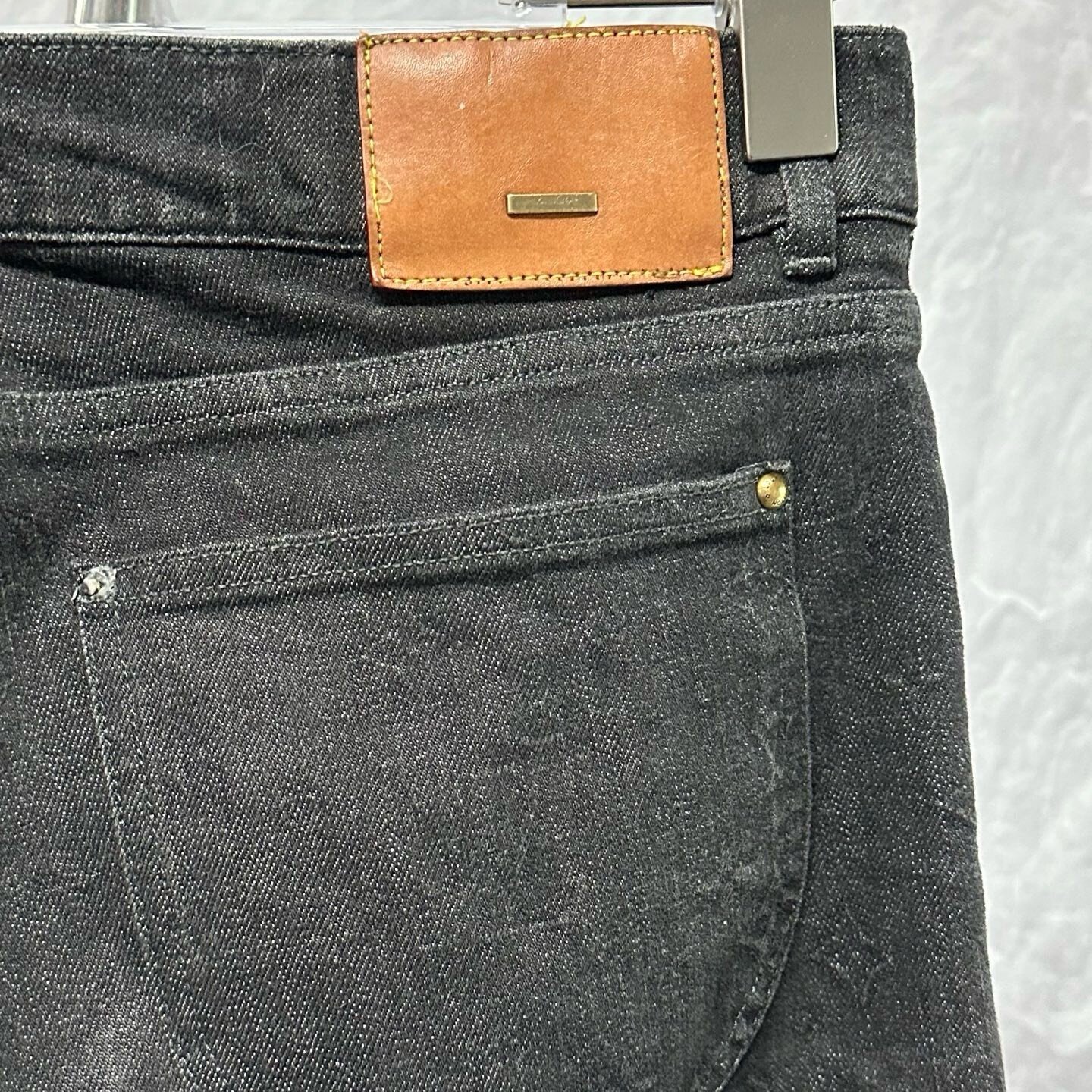 Louis Vuitton Monogram Leather Patch Denim Pants — detail