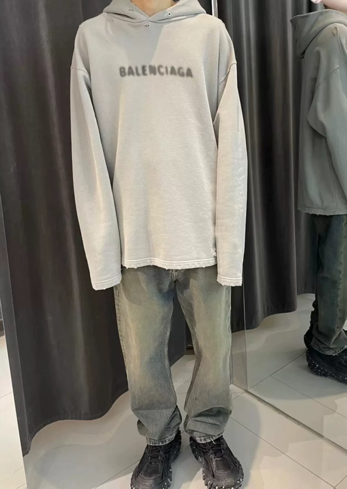 Balenciaga Blurred Logo Distressed Hoodie — front