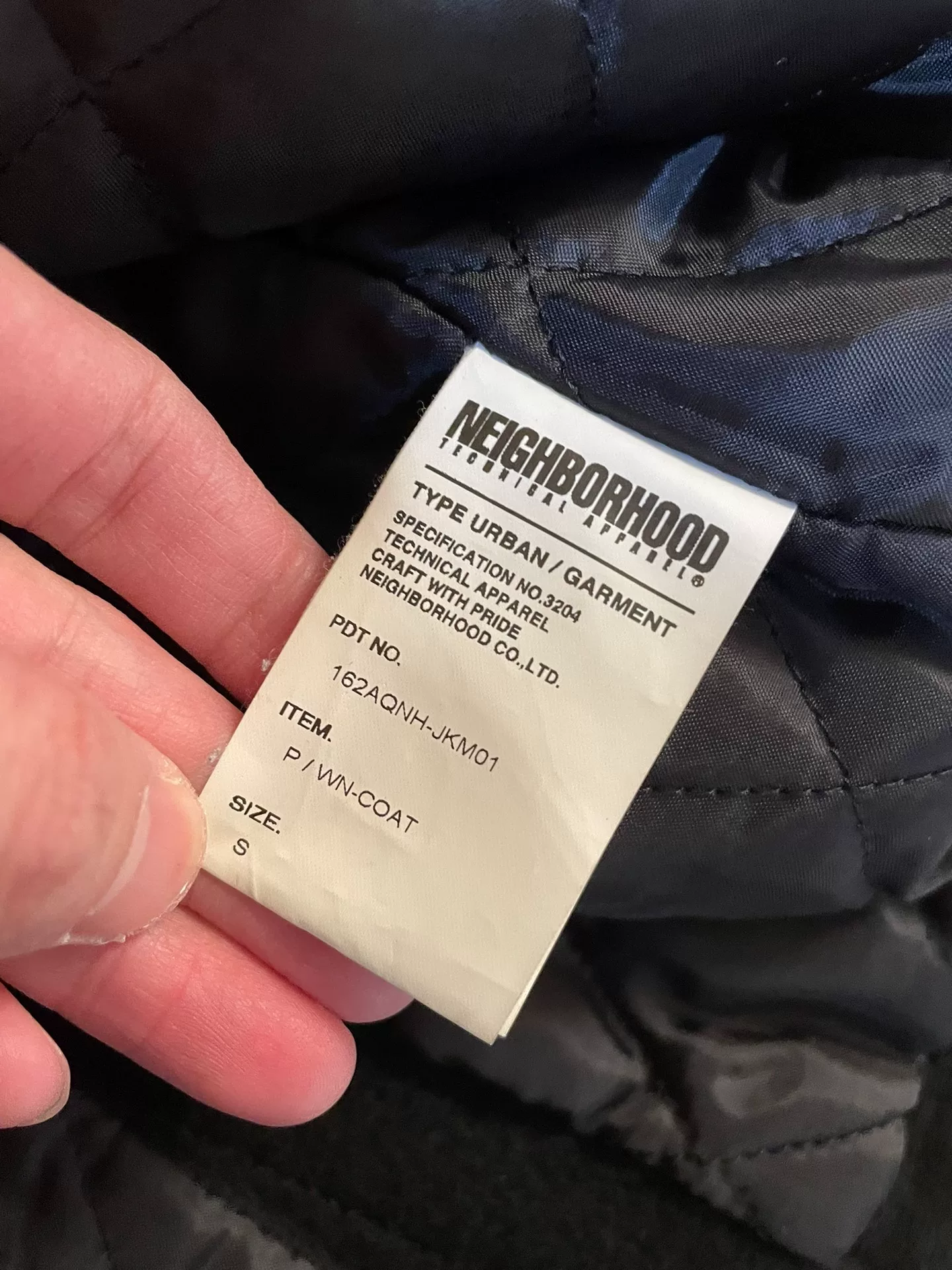 NEIGHBORHOOD Wool Double-Breasted Coat — label