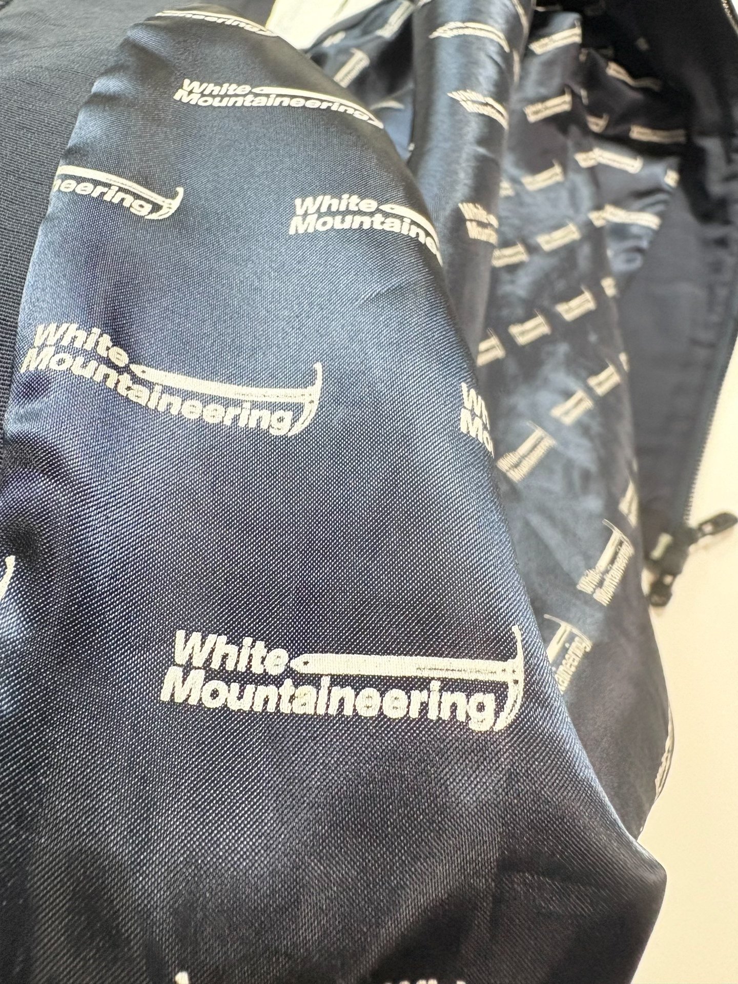 White Mountaineering Dark Blue Vest — label