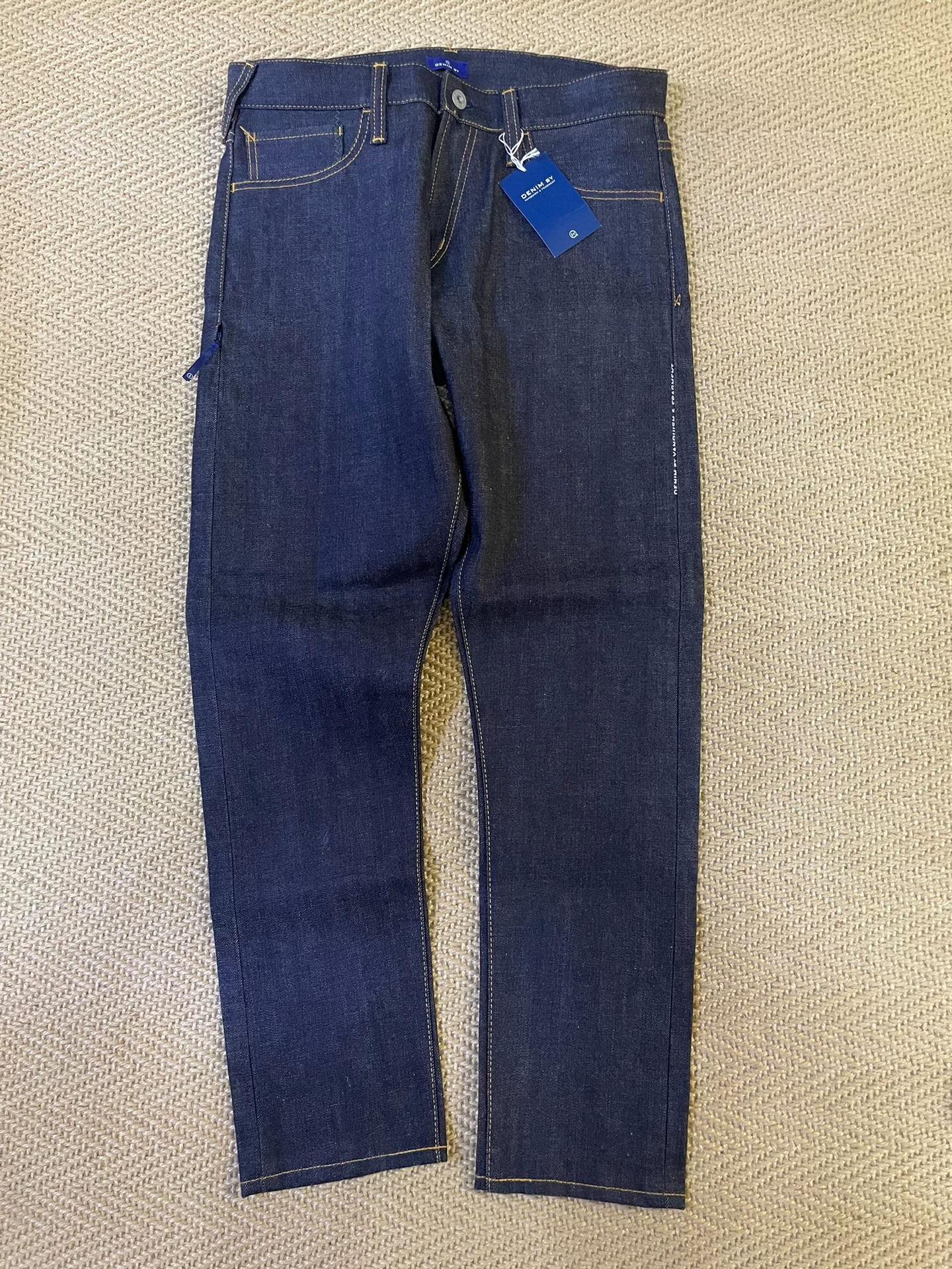 Denim by Vanquish & Fragment Orange Flash Unwashed Raw Jeans — front