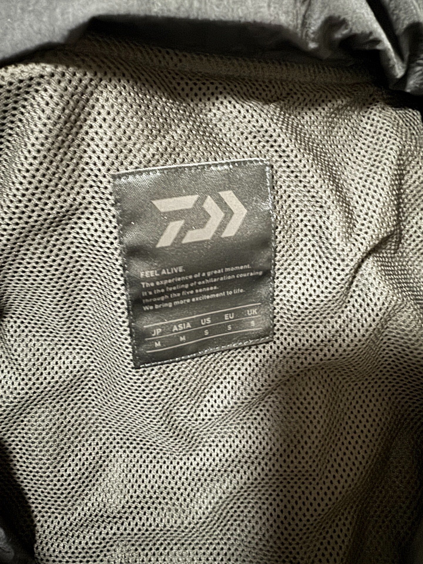Daiwa pier39 22ss Waterproof Hooded Jacket — label