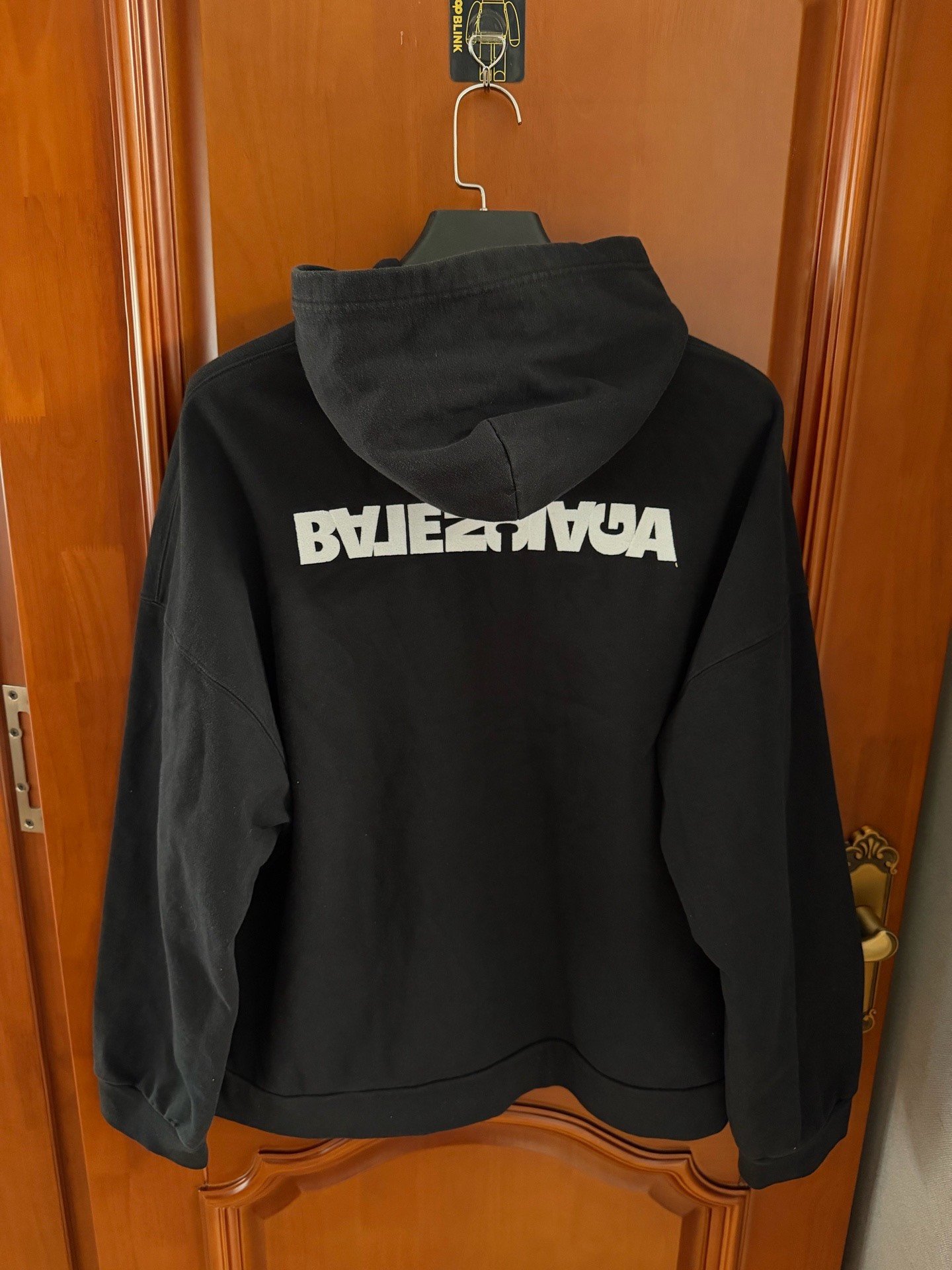 Balenciaga Reversed Logo Hoodie — front