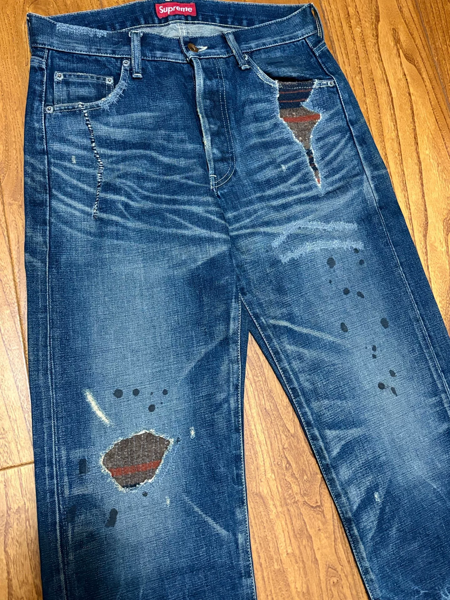 Neighborhood x Supreme Distressed Patch Washed Jeans — detail