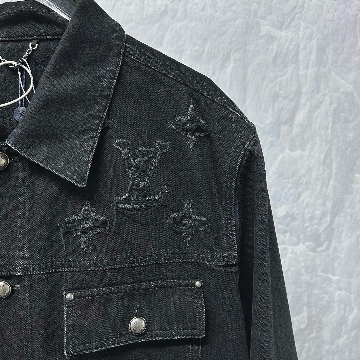 Louis Vuitton SS26 Distressed Logo Denim Jacket — detail