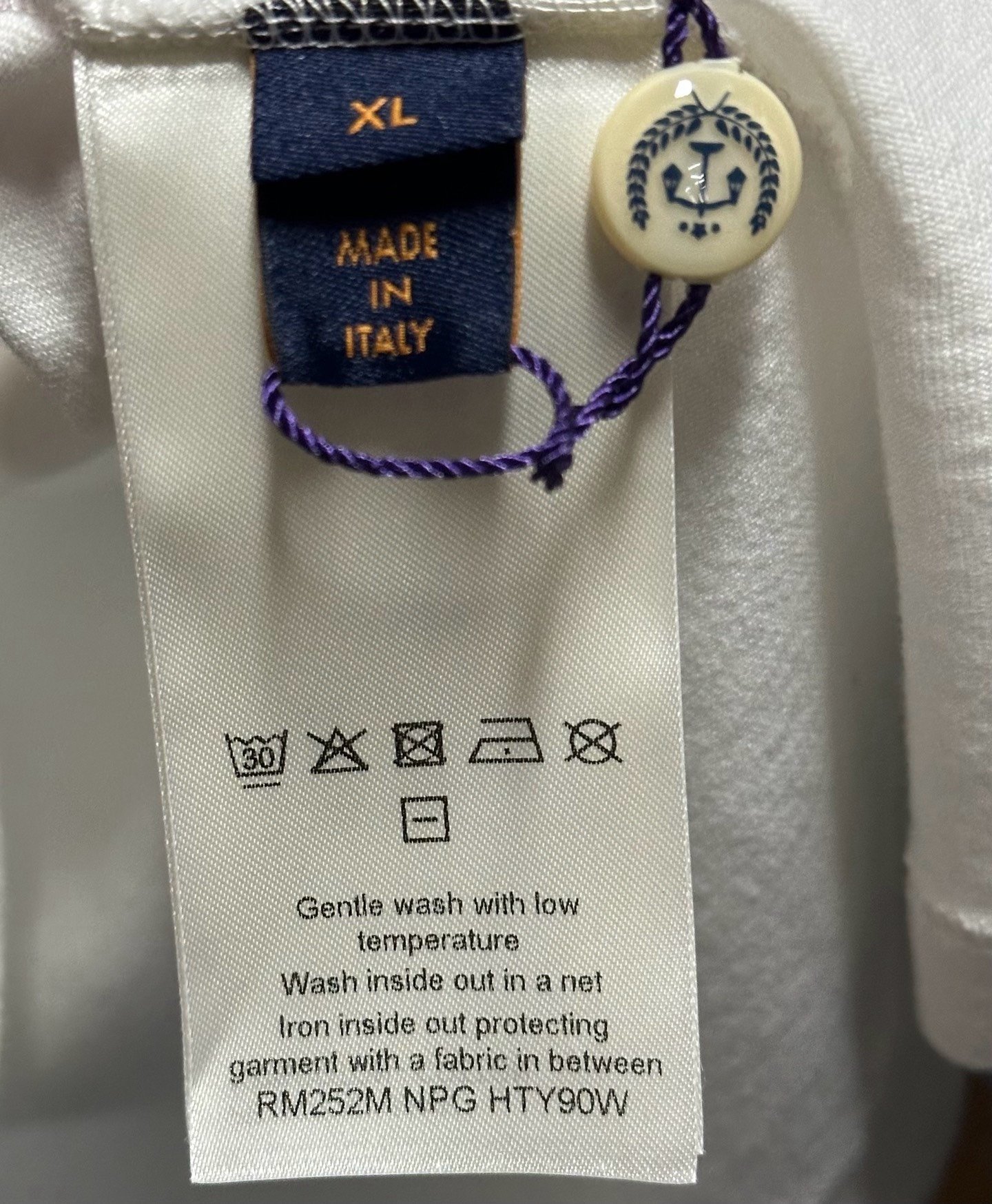 Louis Vuitton x CPFM FW25 Smiley Logo Tee — label
