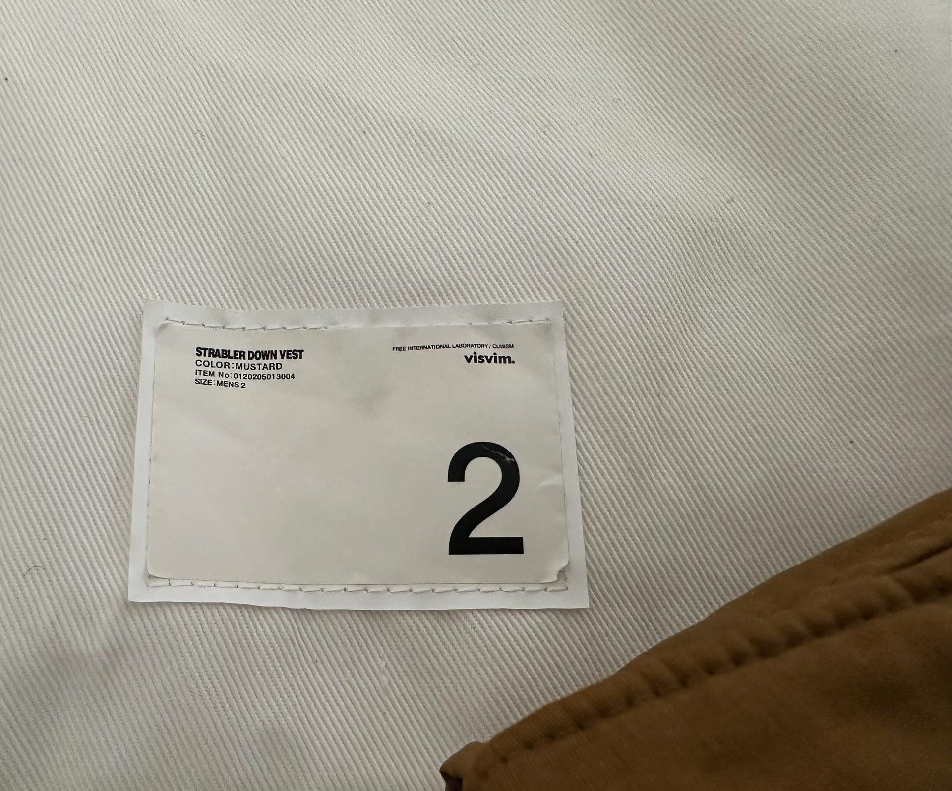 VISVIM 20AW STRABLER DOWN VEST — label