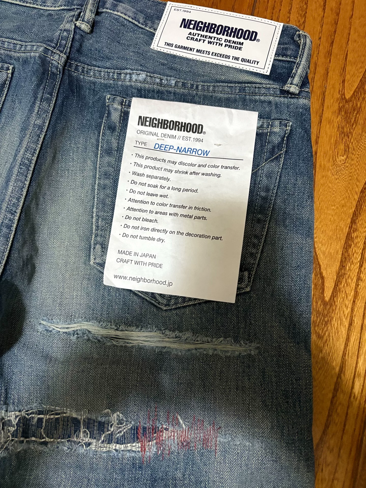 NEIGHBORHOOD CLAW MOD SAVAGE 19AW Patch Jeans — label