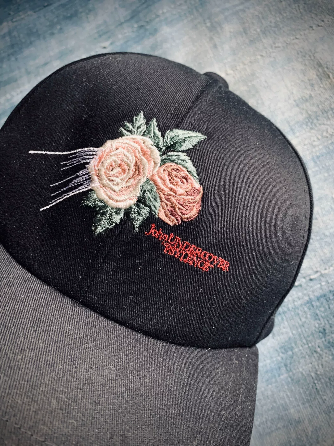 Undercover Flower Embroidery Baseball Cap — front