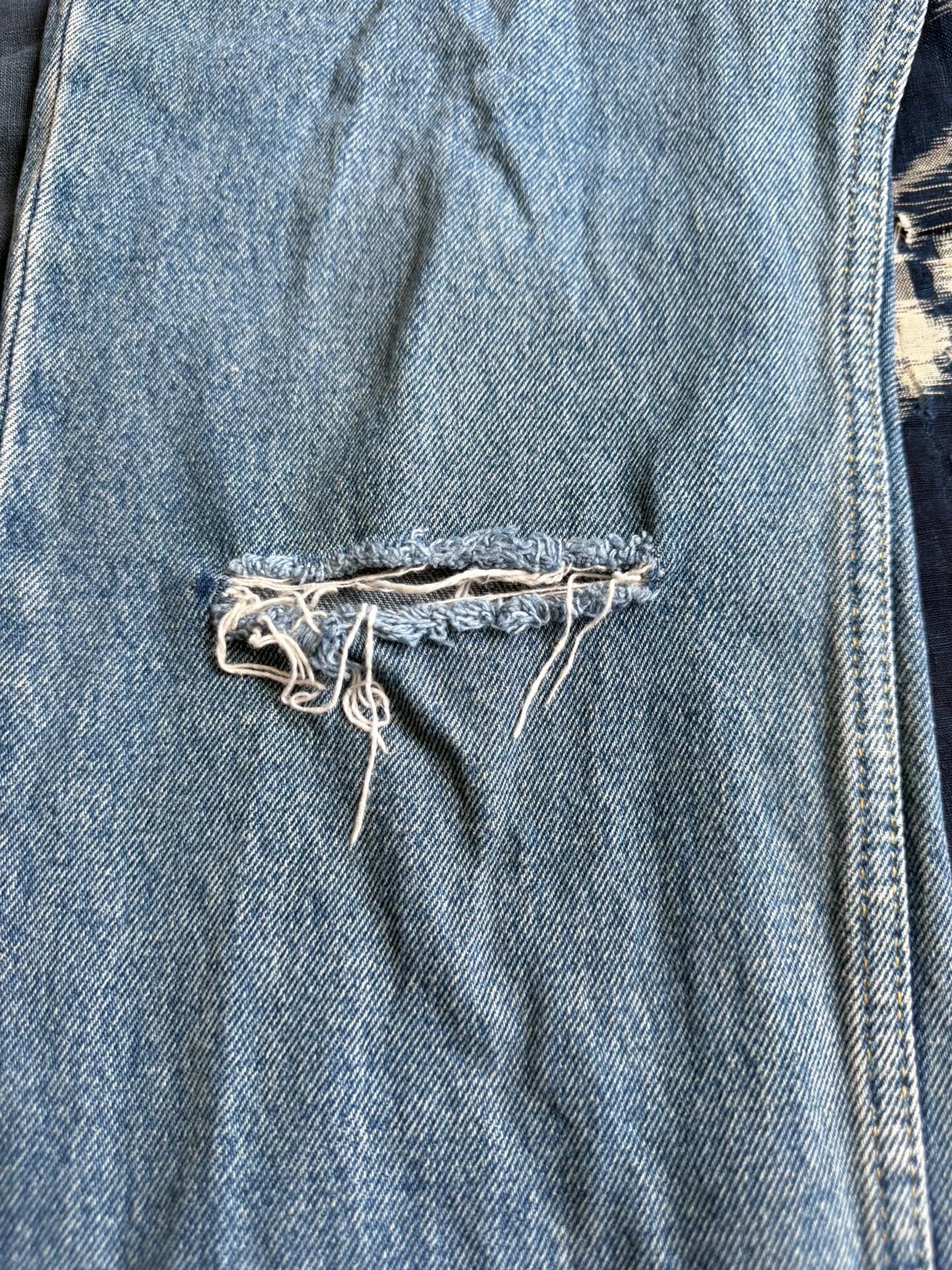 Balenciaga Distressed Vintage Jeans — label