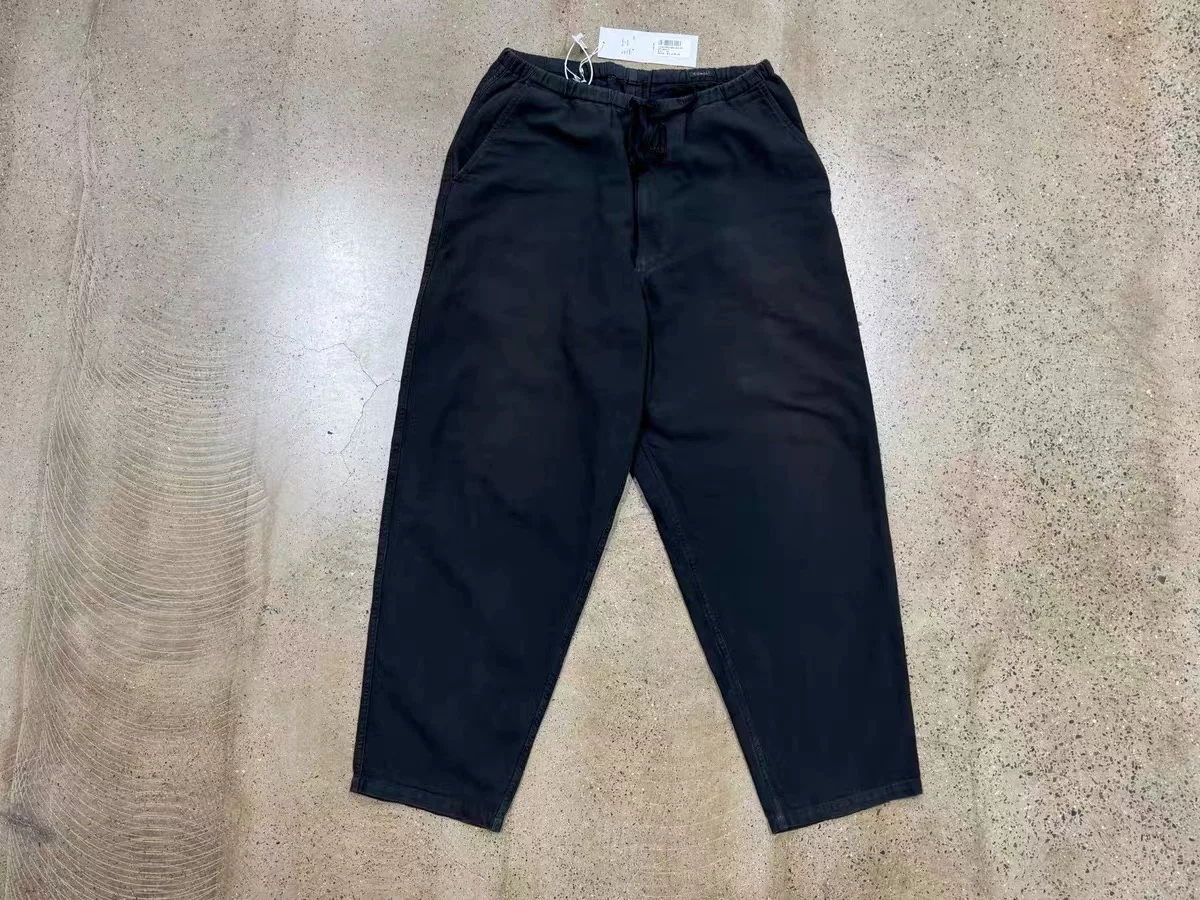 COMOLI Cotton Duck Tapered Pants — front