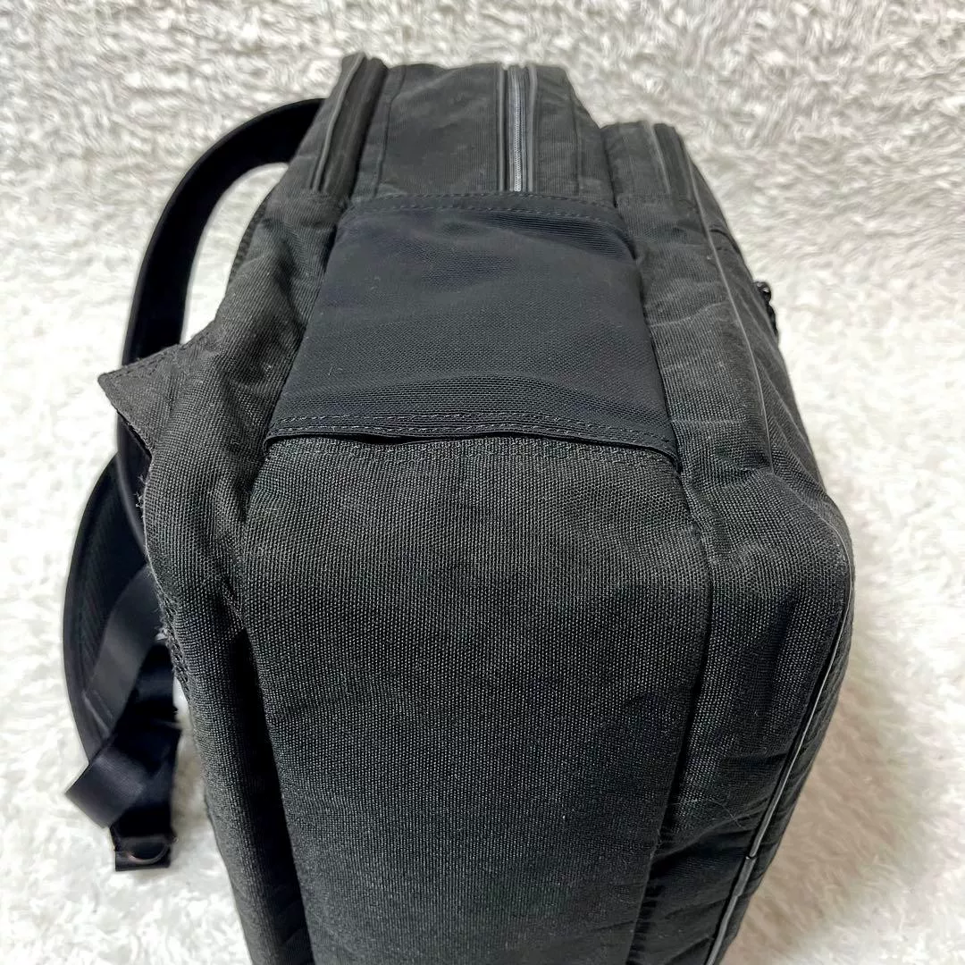 Porter HYBRID Black Backpack — label