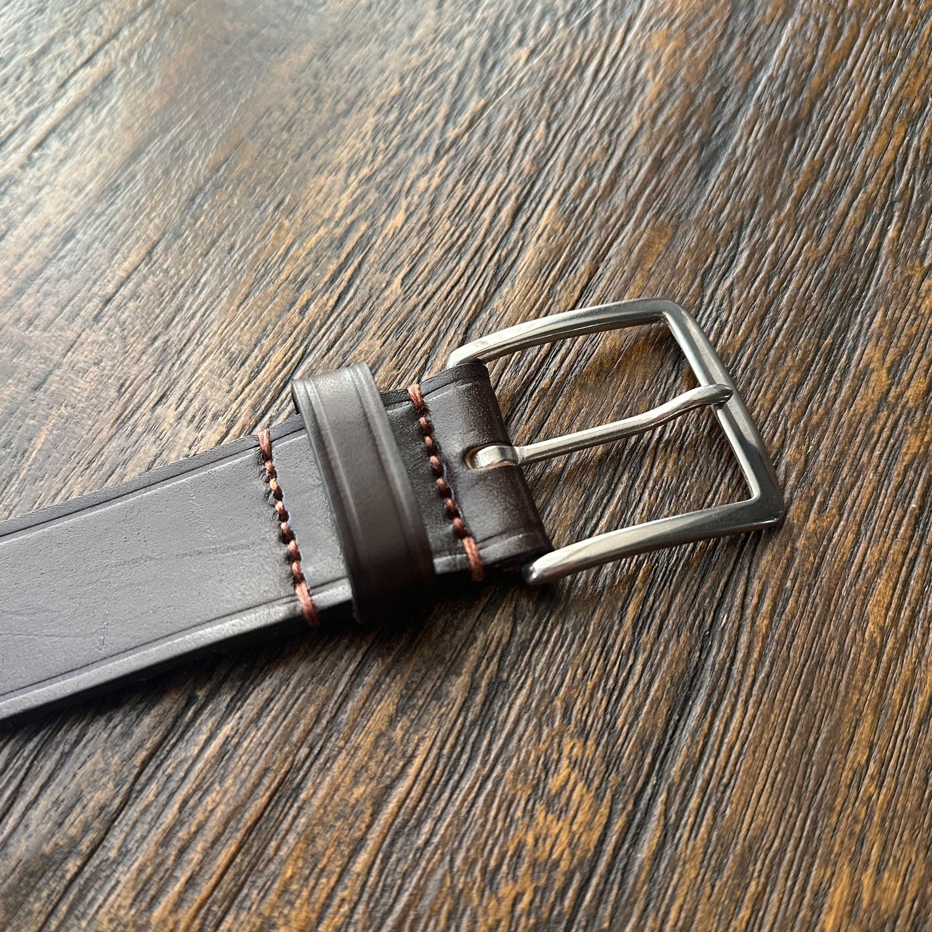 TWC Solid Brass Brown Belt — detail