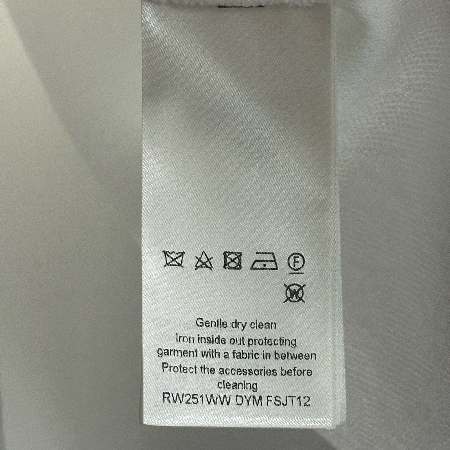 Louis Vuitton SS25 Subtle Monogram Polo — label