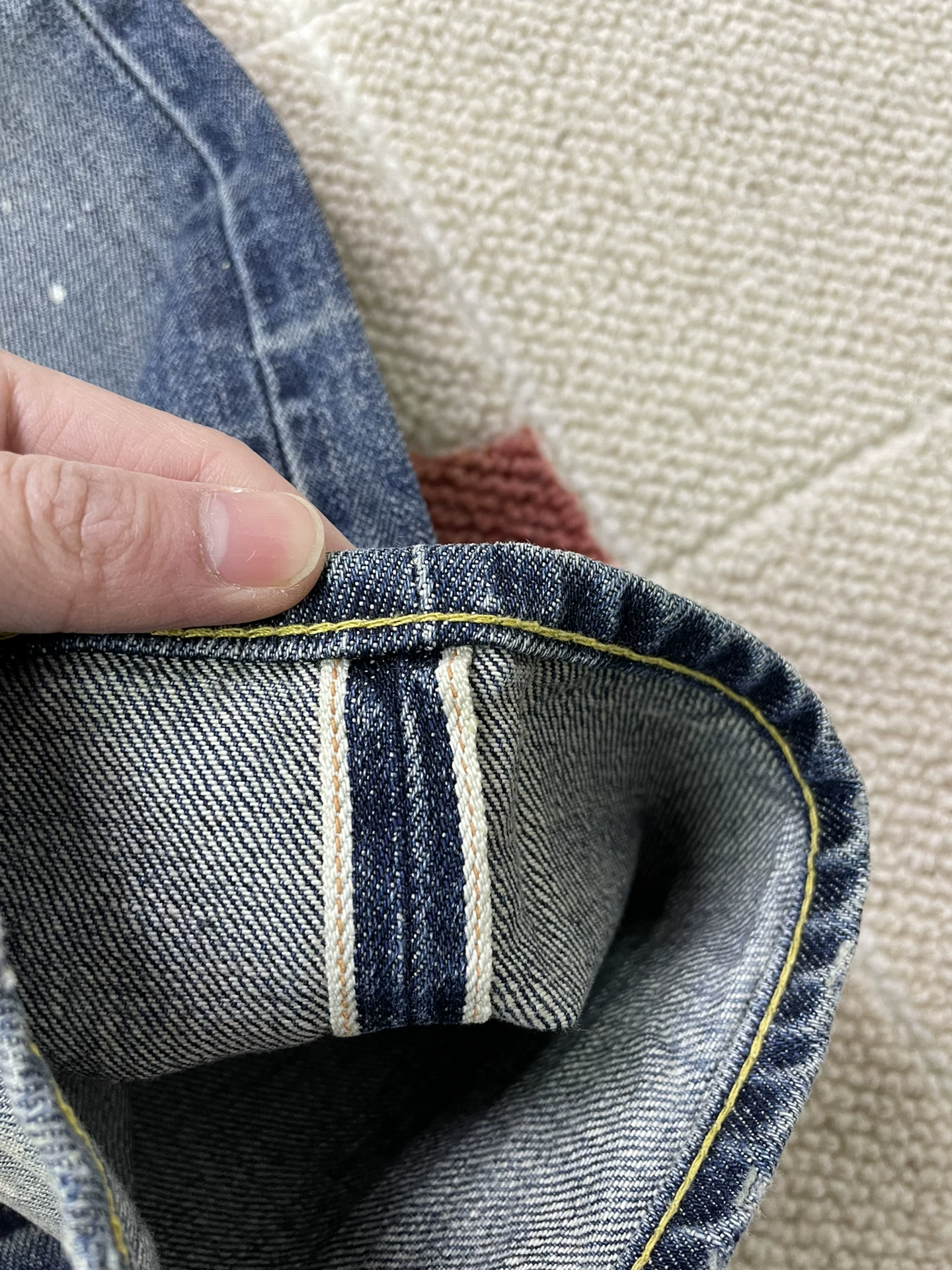 Vanquish & Fragment Distressed Denim Jeans — label