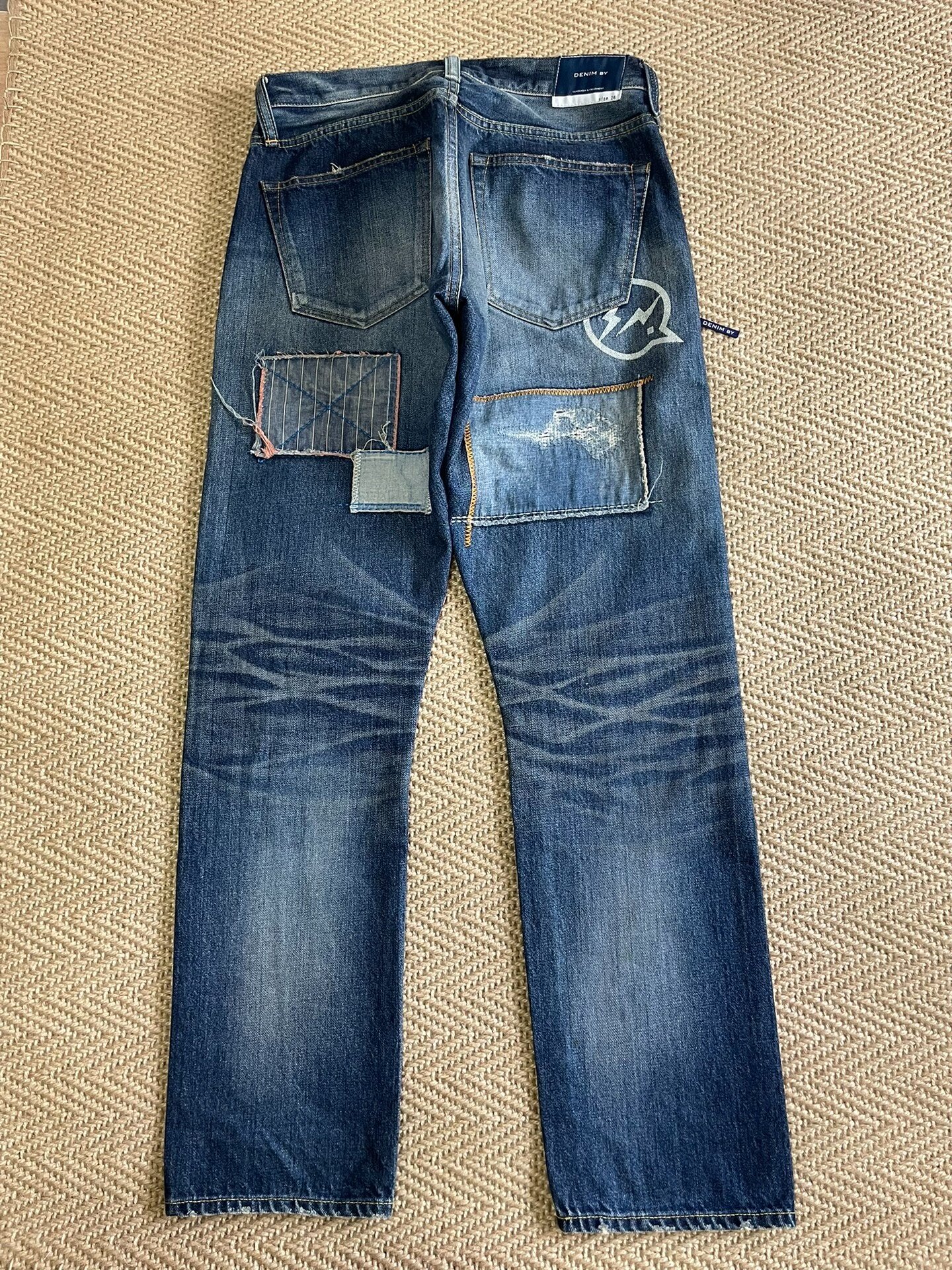Vanquish Fragment Lightning Distressed Patch Jeans — front