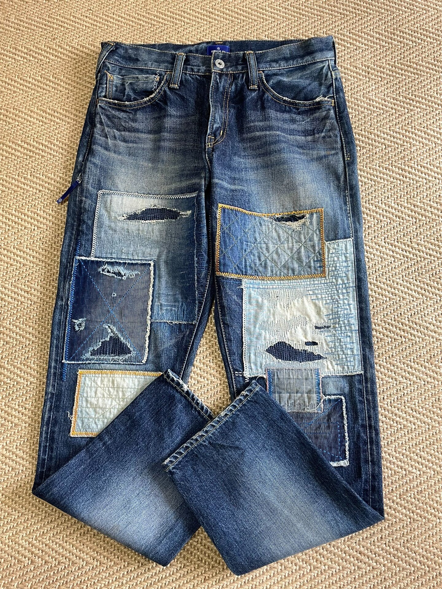 Vanquish Fragment Lightning Distressed Patch Jeans — label
