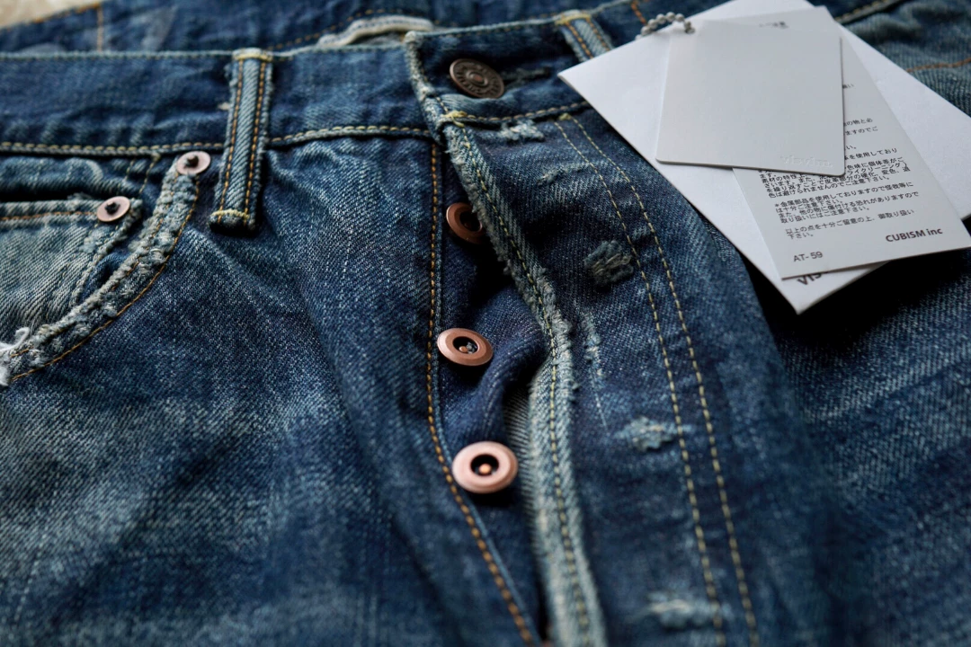 VISVIM Distressed Straight Blue Jeans — label