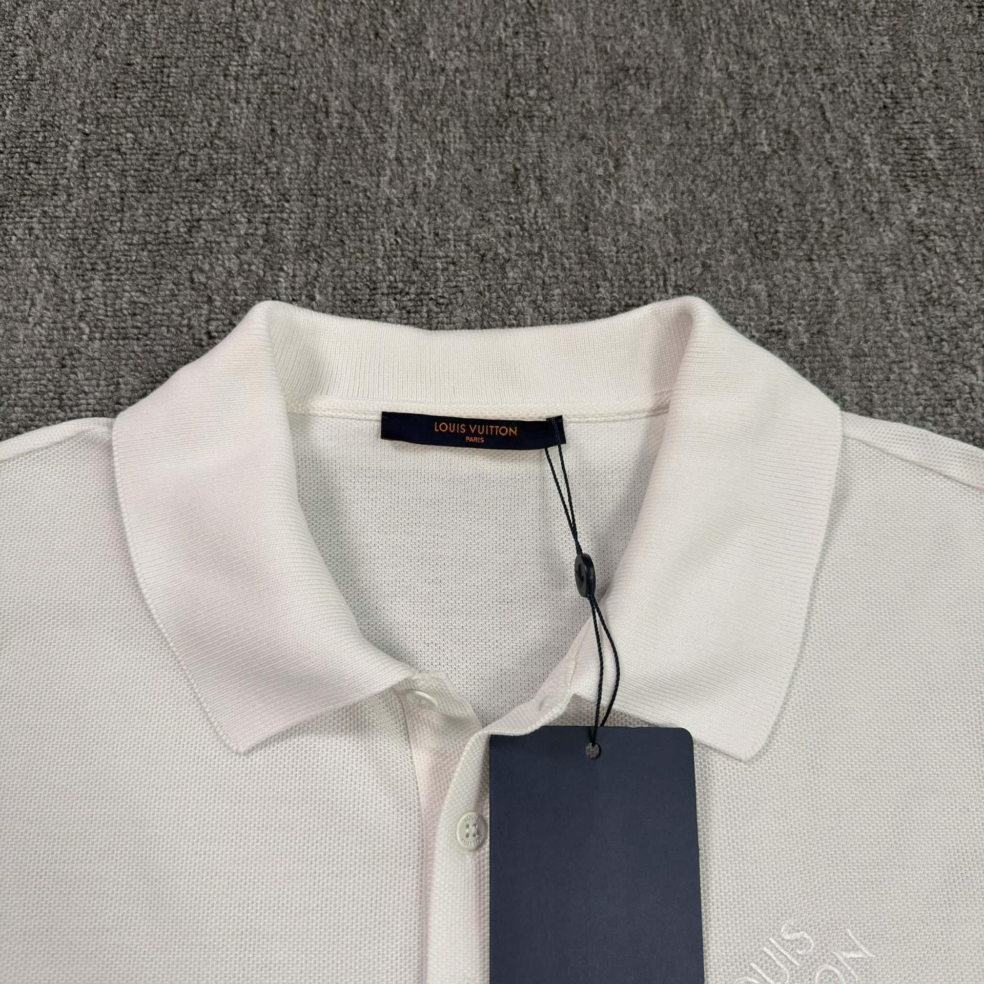 Louis Vuitton White Embroidered Logo Polo — detail