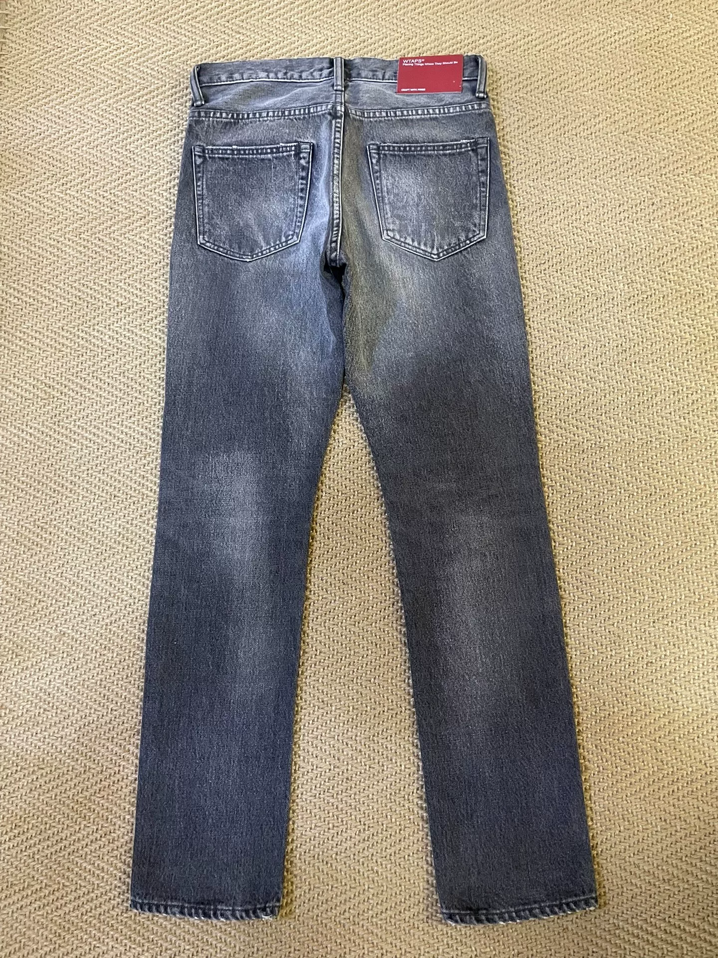 WTAPS Very Skinny Washed Jeans — front