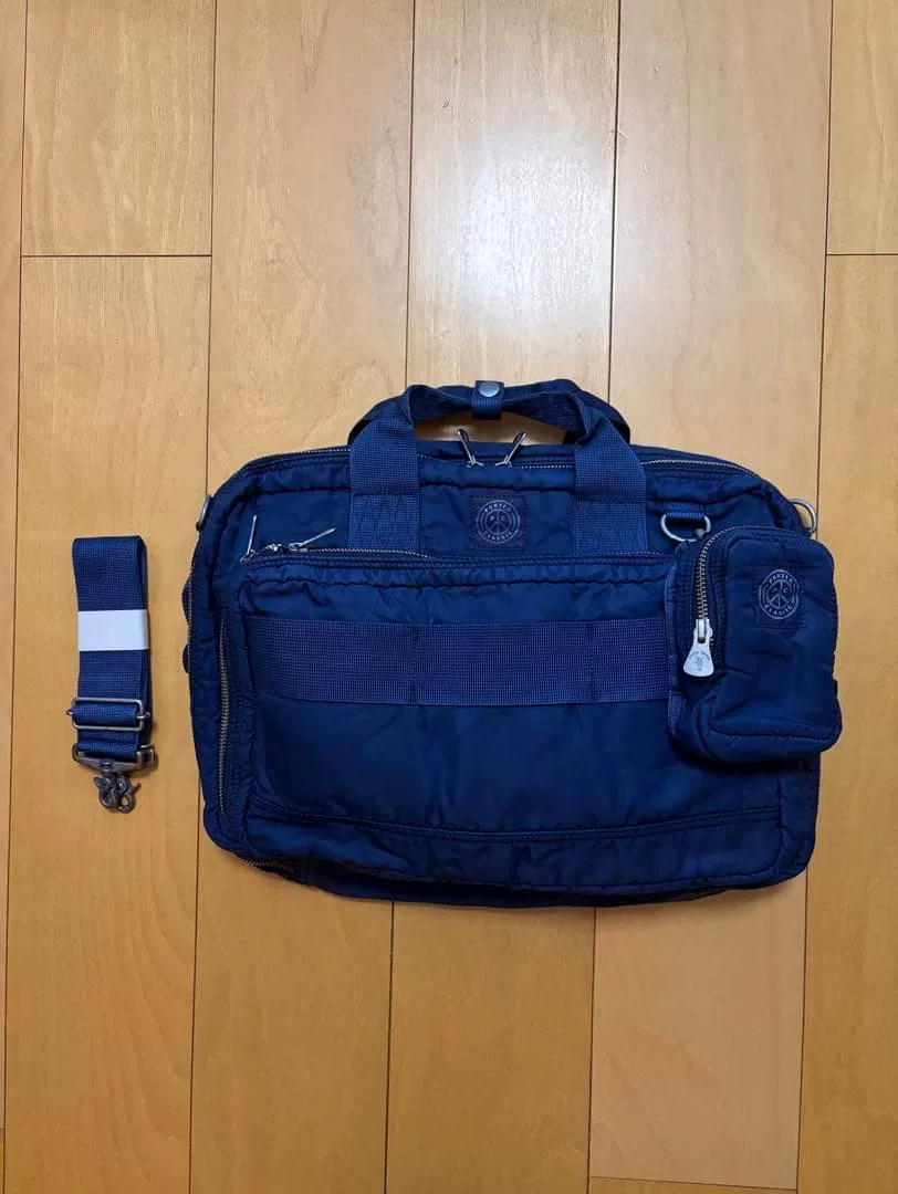 PORTER CLASSIC Blue 3-Way Briefcase — label