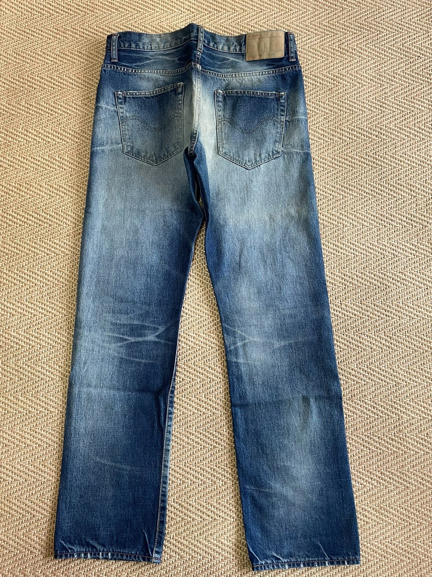 WTAPS Blue Skinny Distressed Jeans — front