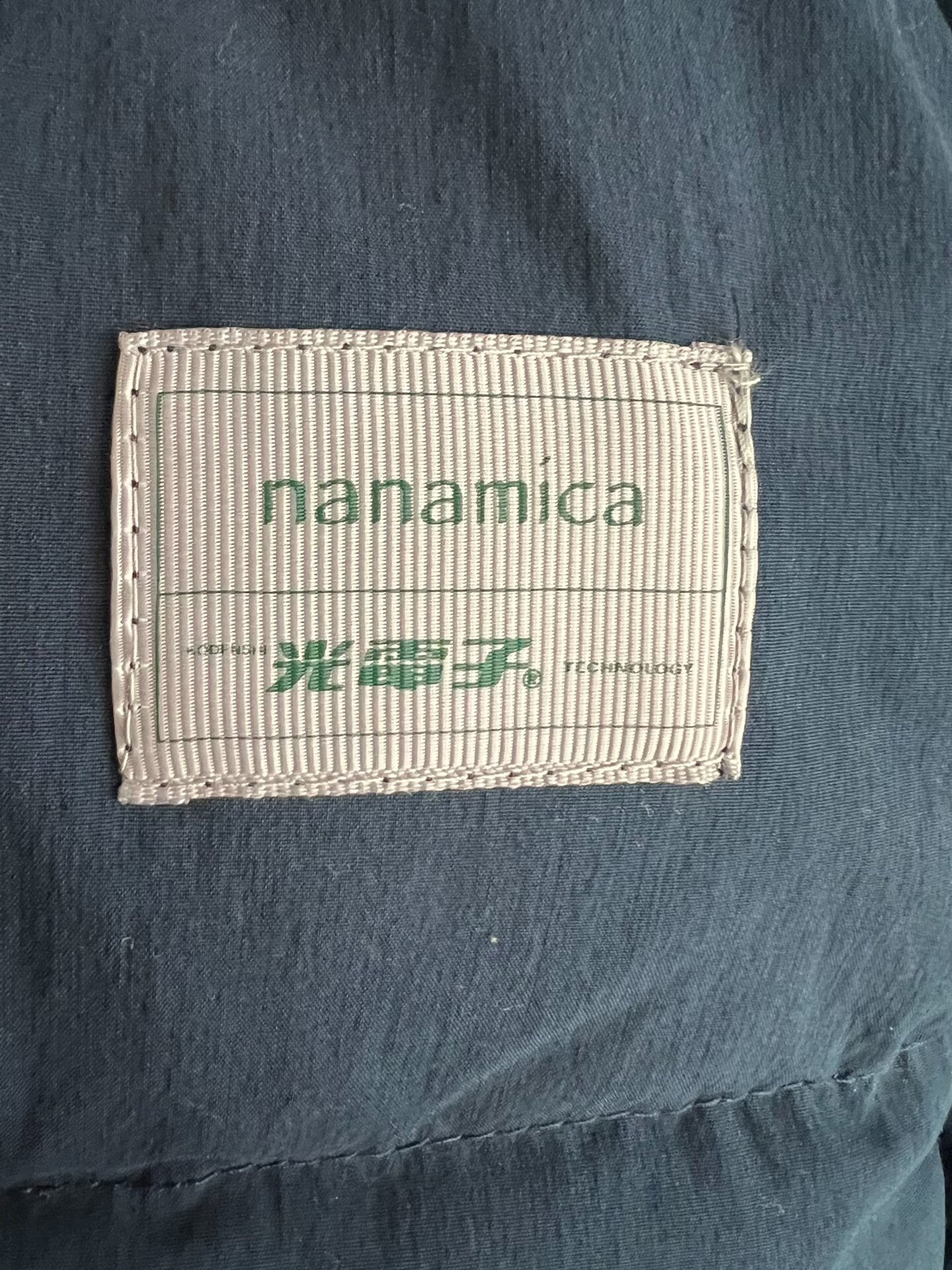 nanamica Blue Down Vest — label