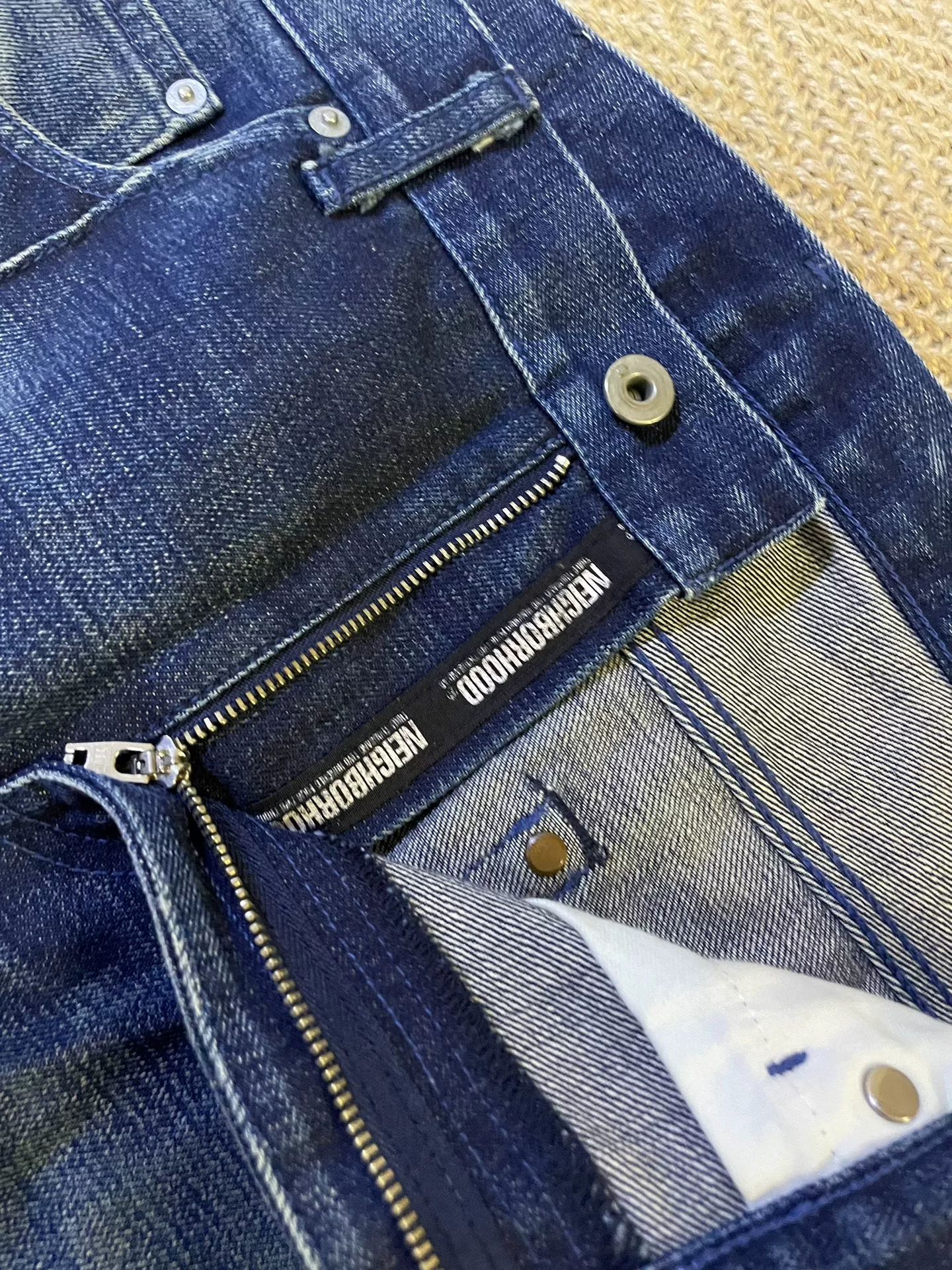 NEIGHBORHOOD Early Seam Washed Jeans — label