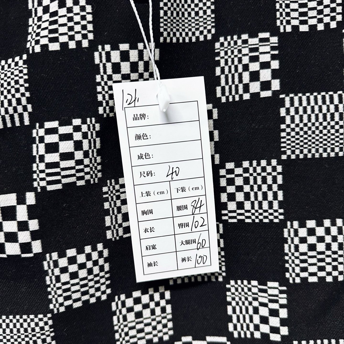 Louis Vuitton Checkerboard Wool Trousers — label