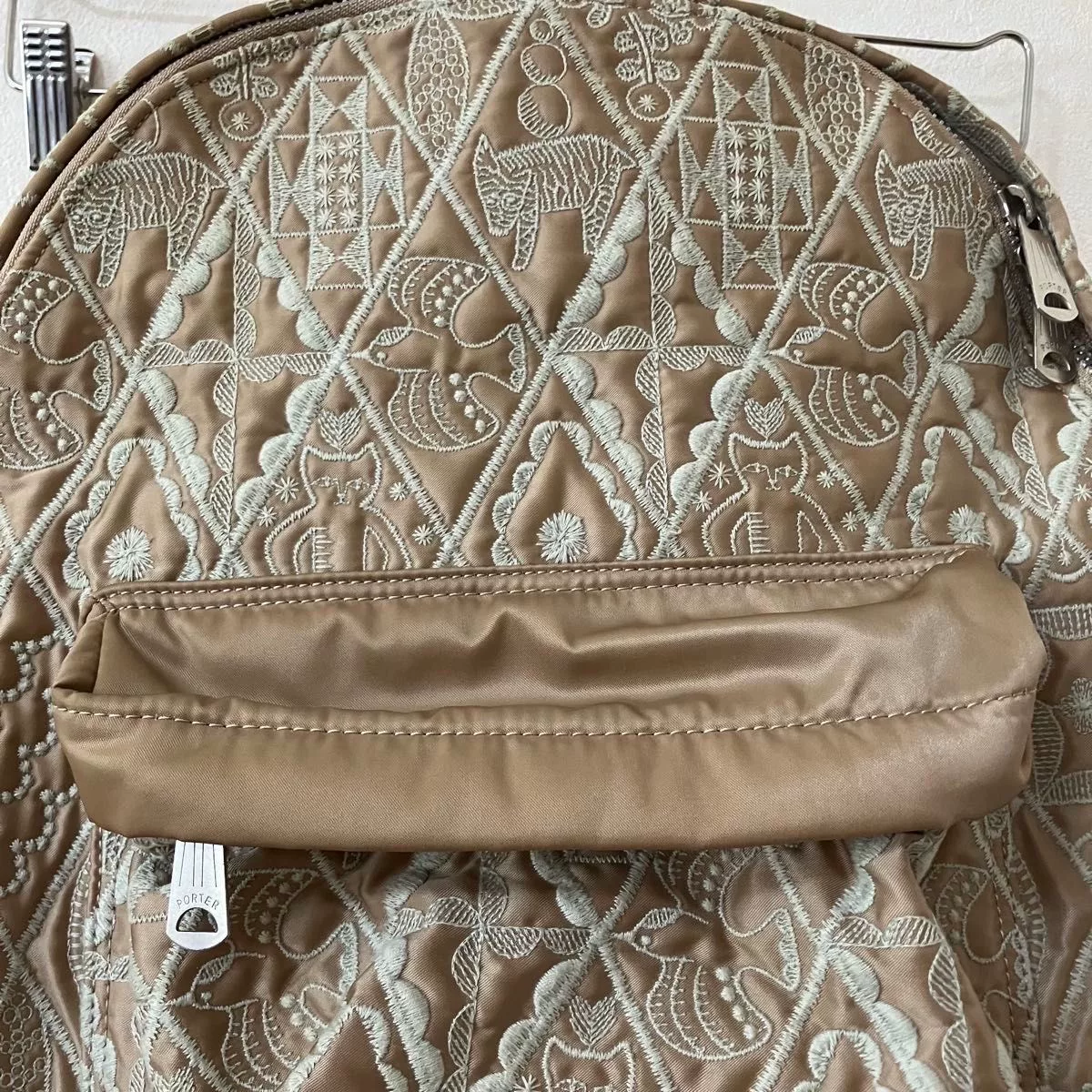 Porter x Mina Perhonen Beige Embroidered Backpack — detail