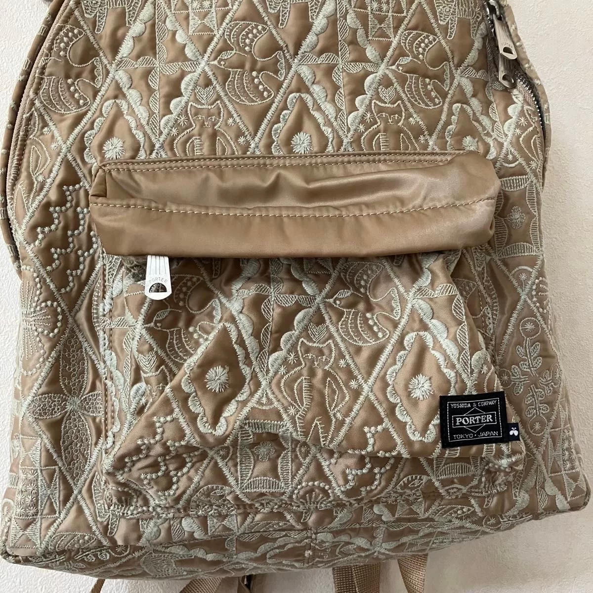 Porter x Mina Perhonen Beige Embroidered Backpack — front