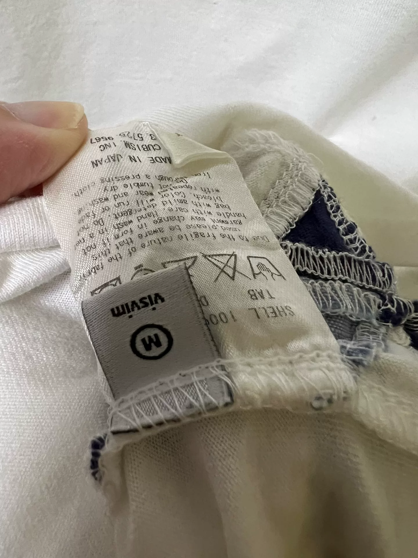 visvim Side Nez Perce Triangle Patchwork Tee — label