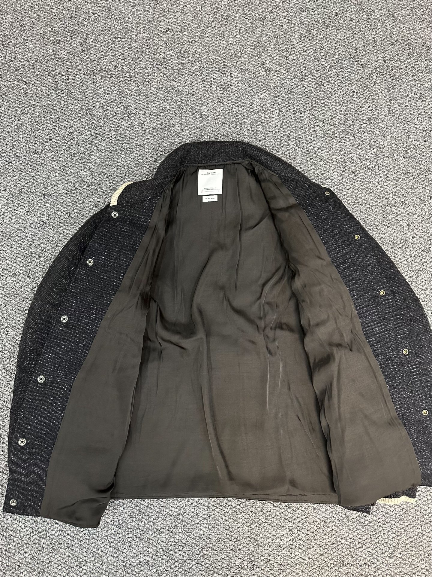 visvim Black Down Jacket — label