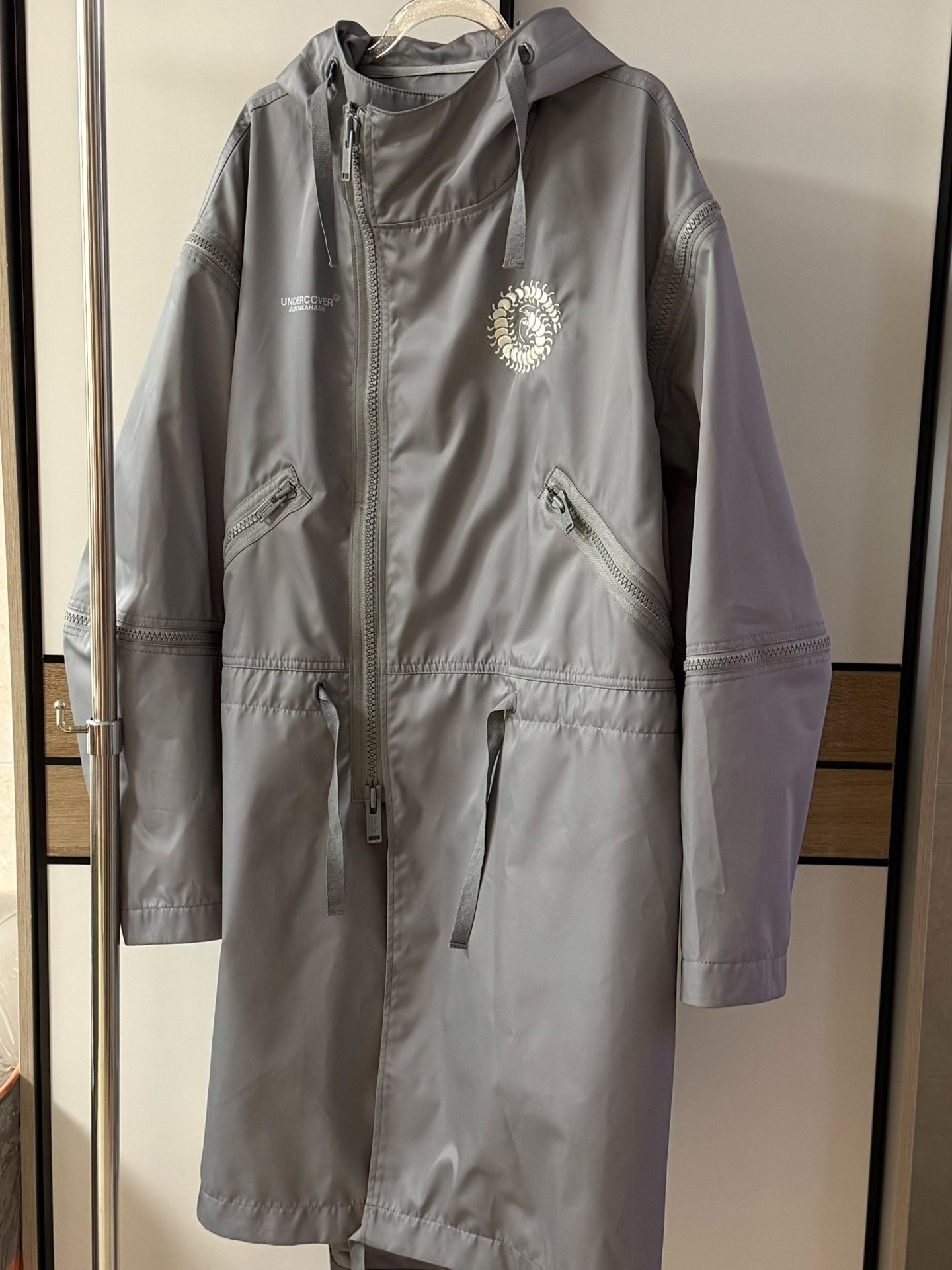 Undercover AW20 Fallen Man Fishtail Parka — back