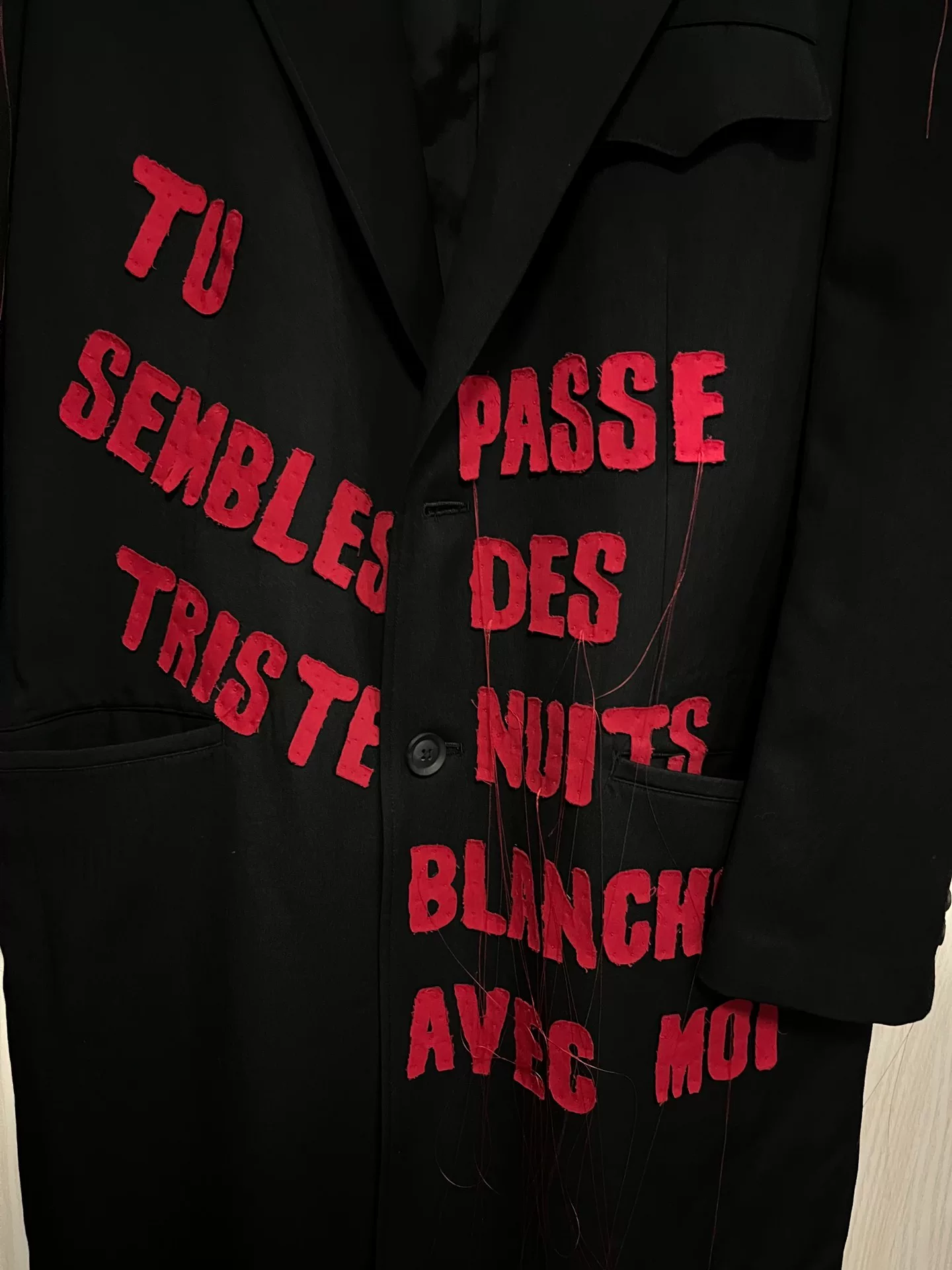 Yohji Yamamoto Black Red Text Coat — detail