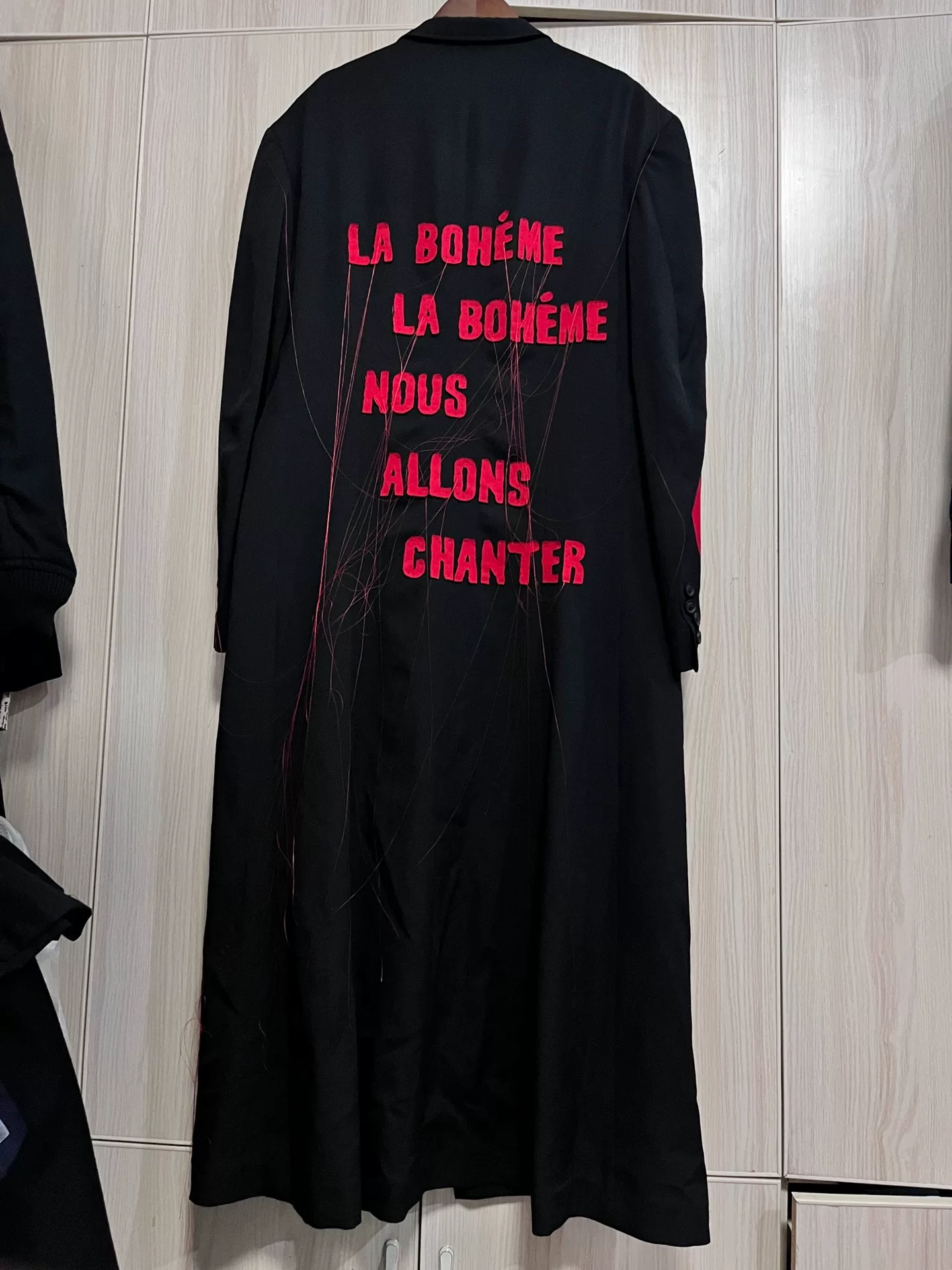 Yohji Yamamoto Black Red Text Coat — label