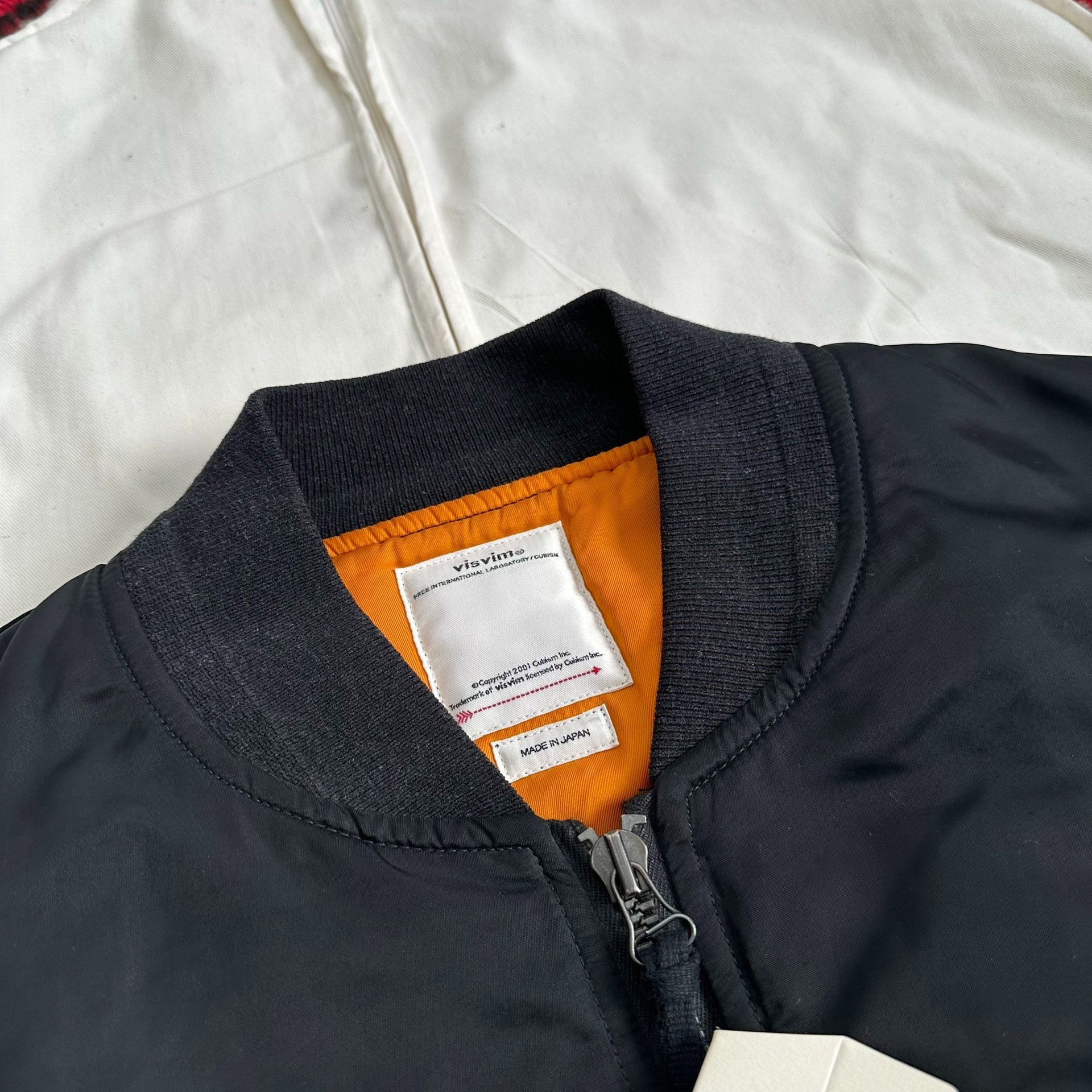 VISVIM 20AW THORSON MA1 Mud-Dyed Jacket — label