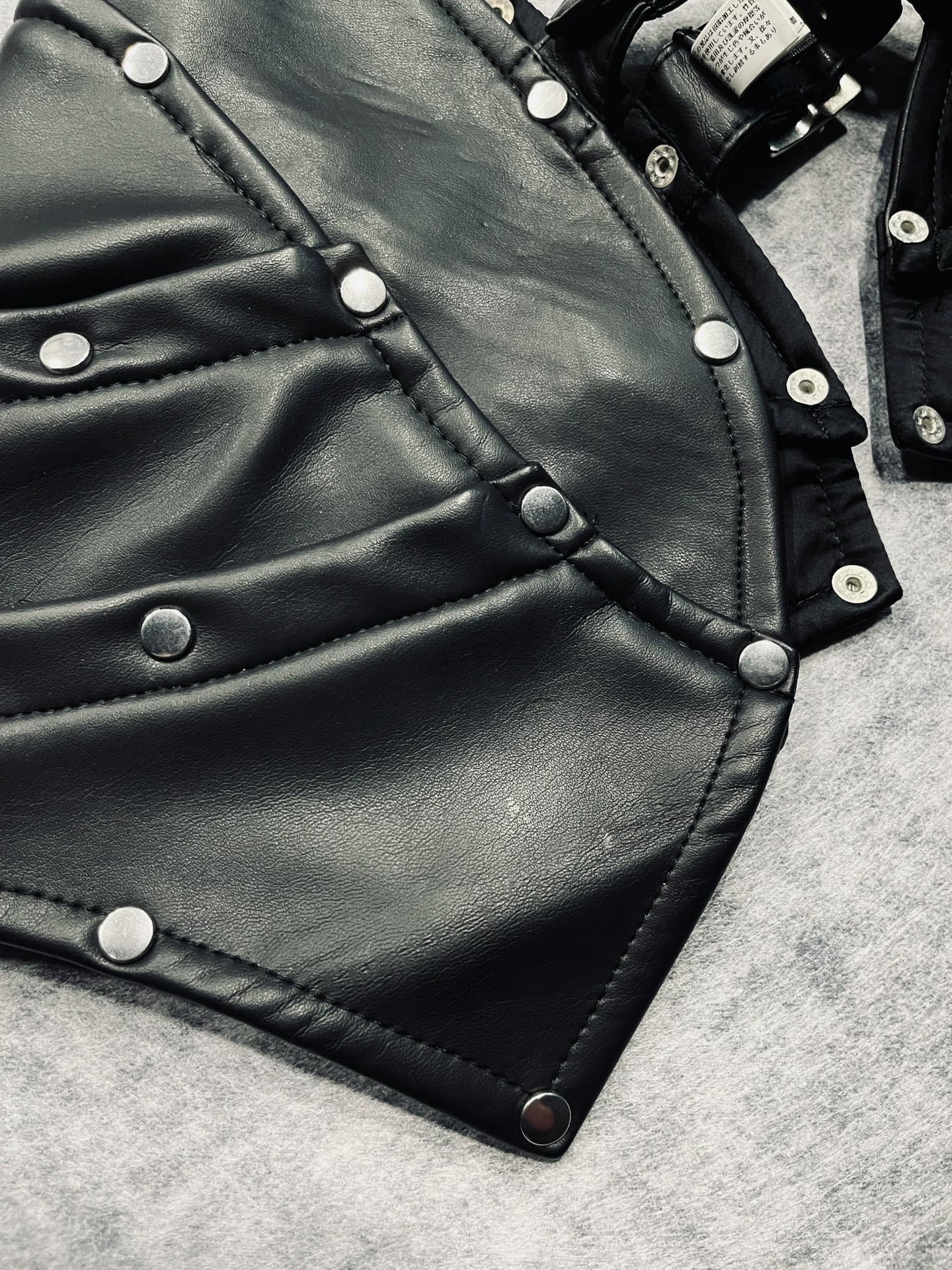 Comme des Garcons Homme Plus Leather Shoulder Armor — label