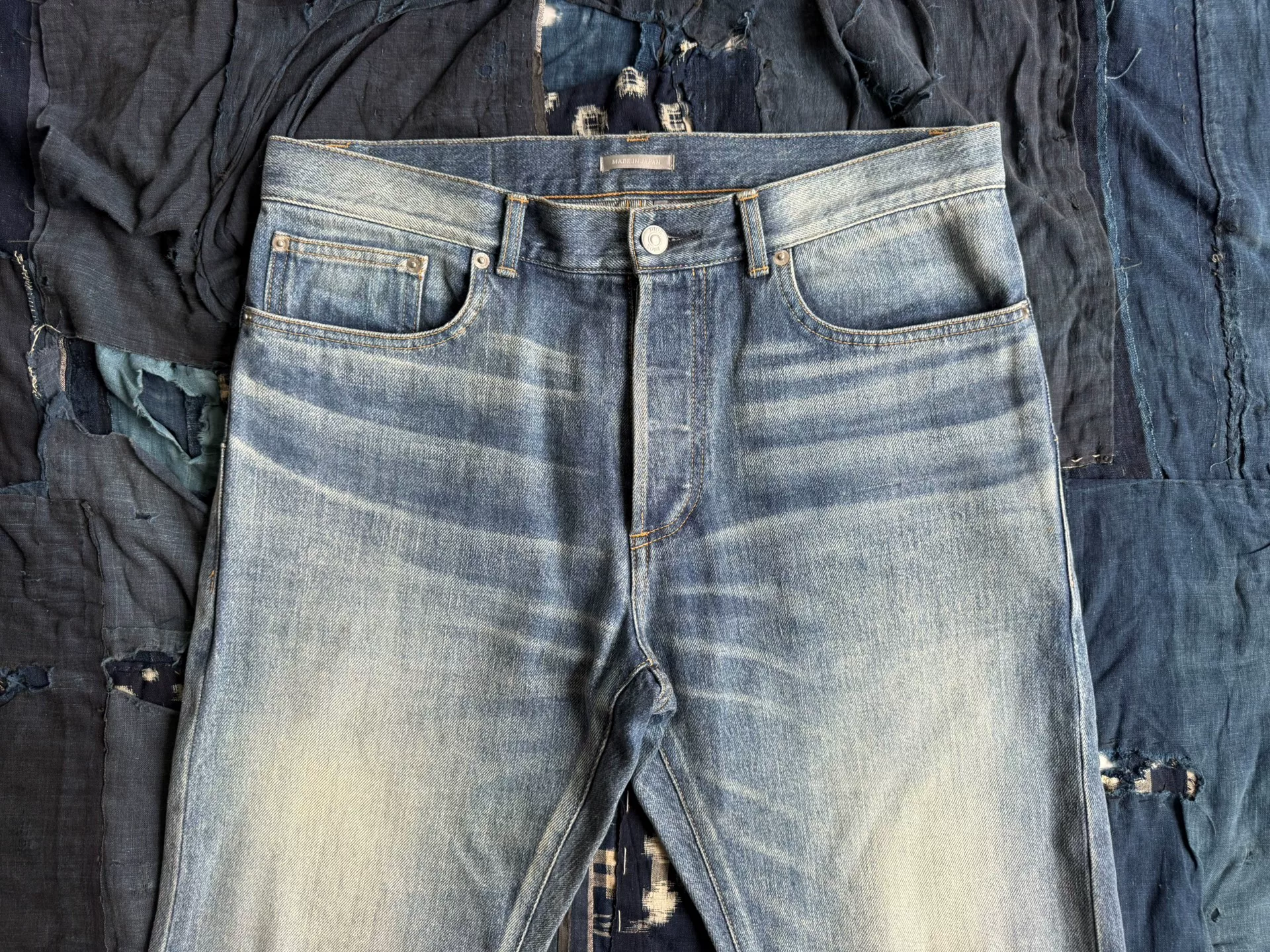 Dior Washed Distressed Straight Jeans — detail