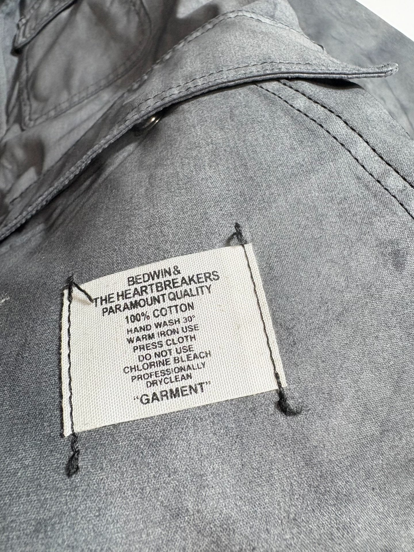BEDWIN Distressed Hooded Utility Jacket — label